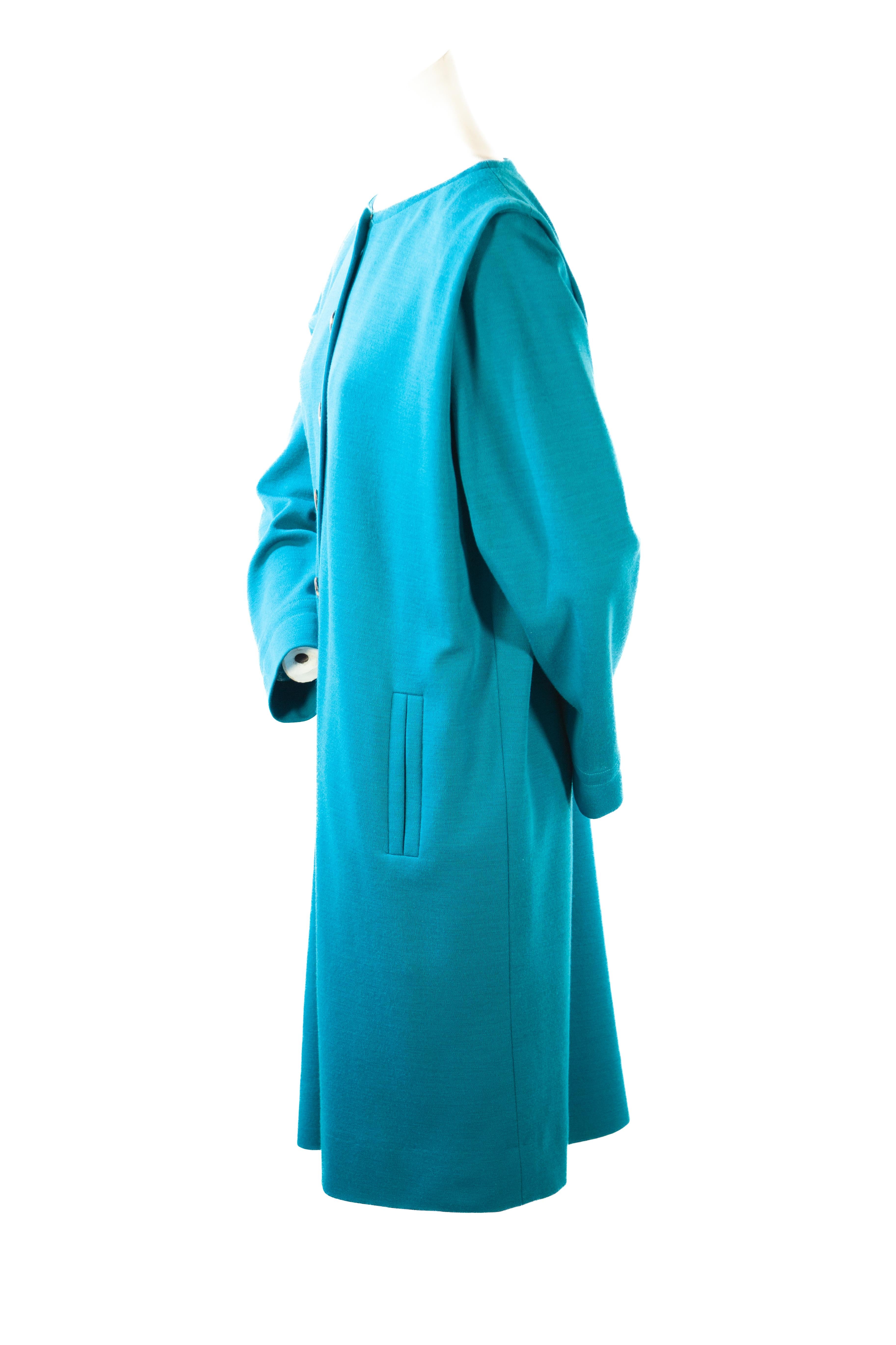 Yves Saint Laurent turquoise long sleeve button up dress

EU 42