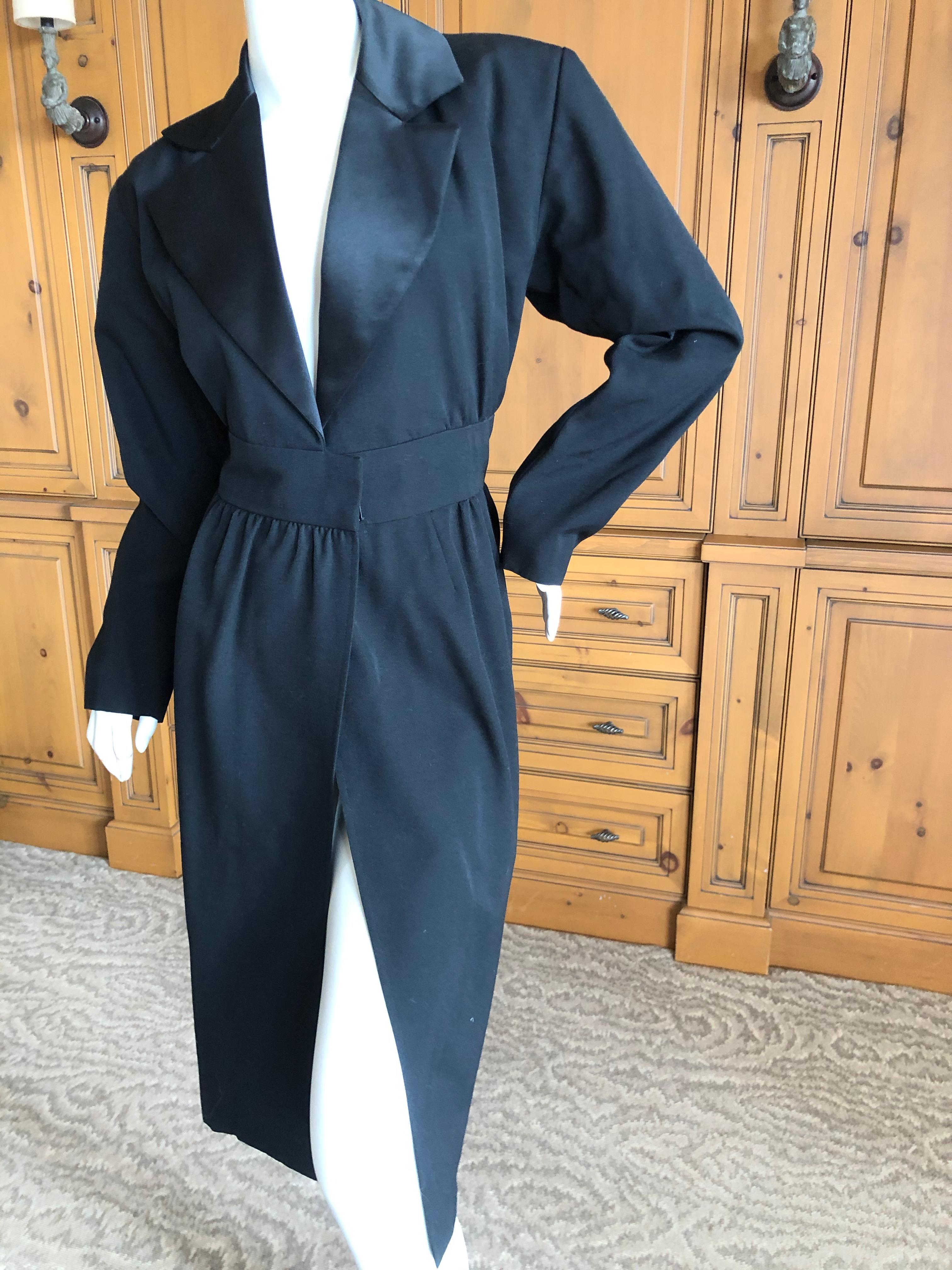 Yves Saint Laurent Rive Gauche Vintage 80's Le Smoking Satin Lapel Tuxedo Wrap Dress
 Size 36, this runs VERY large for this size, I would estimate it size 42 (8-10)
It is a wrap style dress  with very strong shoulders.
Bust 42