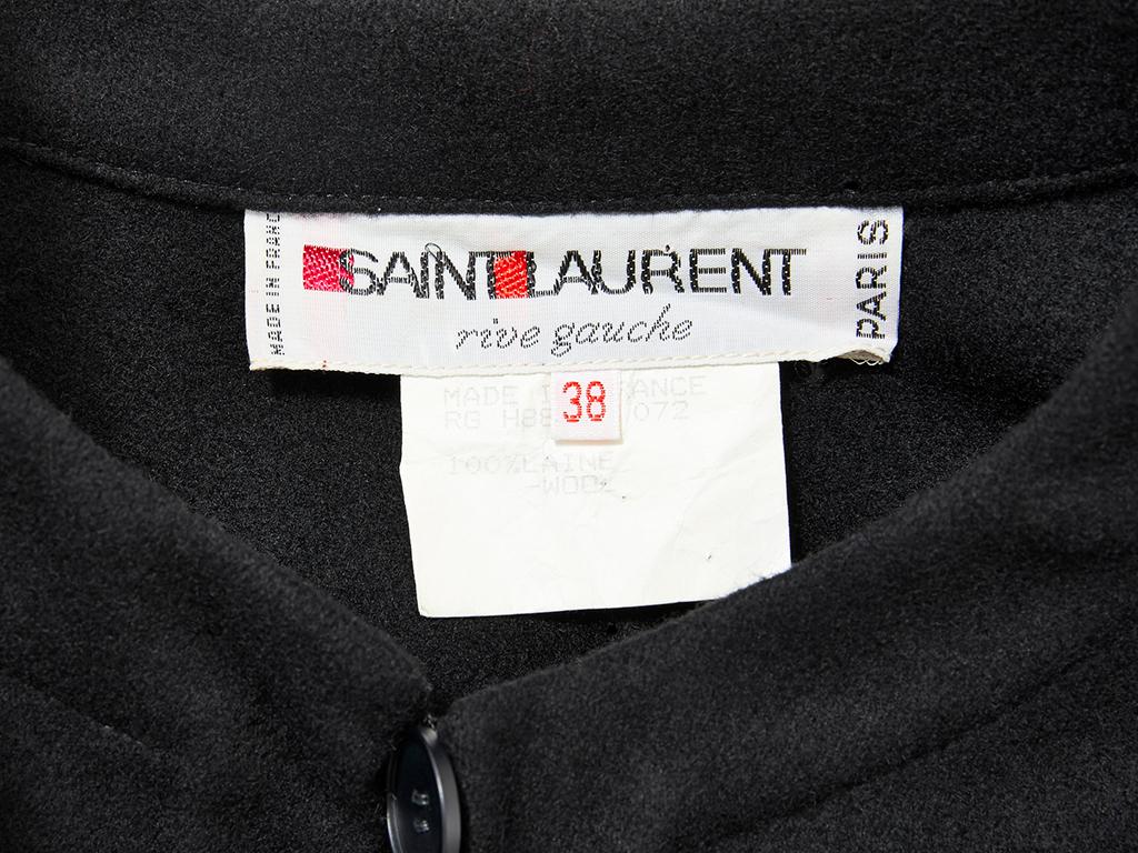 Yves Saint Laurent, Rive Gauche, black wool, maxi cape with a single button closure at the neck.