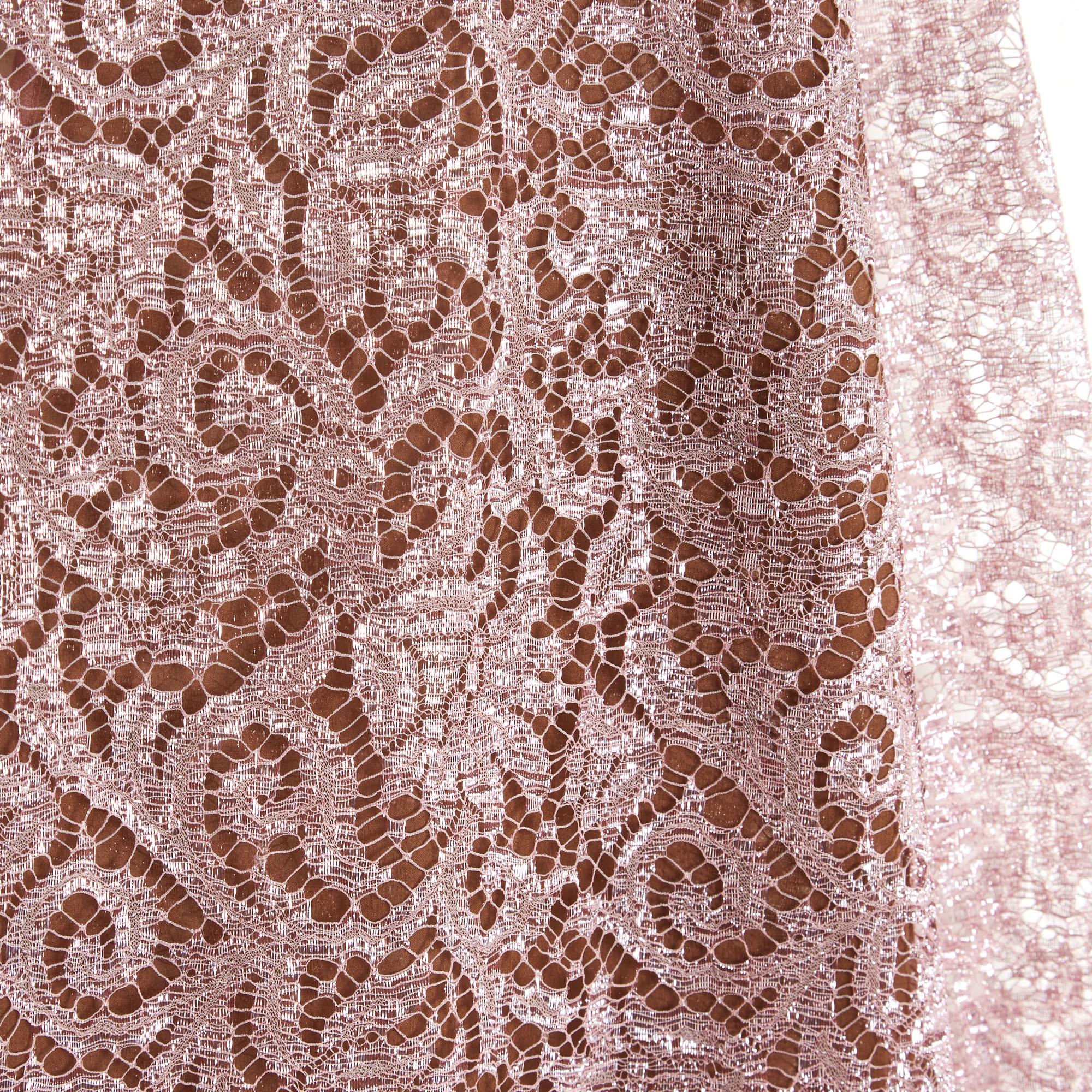Top Yves Saint Laurent Rive Gauche circa 1980/85 blouse in slightly parma pink lurex lace, round neck closed by a dress button in the neck, long sleeves, the whole edged with coordinated satin ribbon, lining of fine dark skin-colored silk muslin on