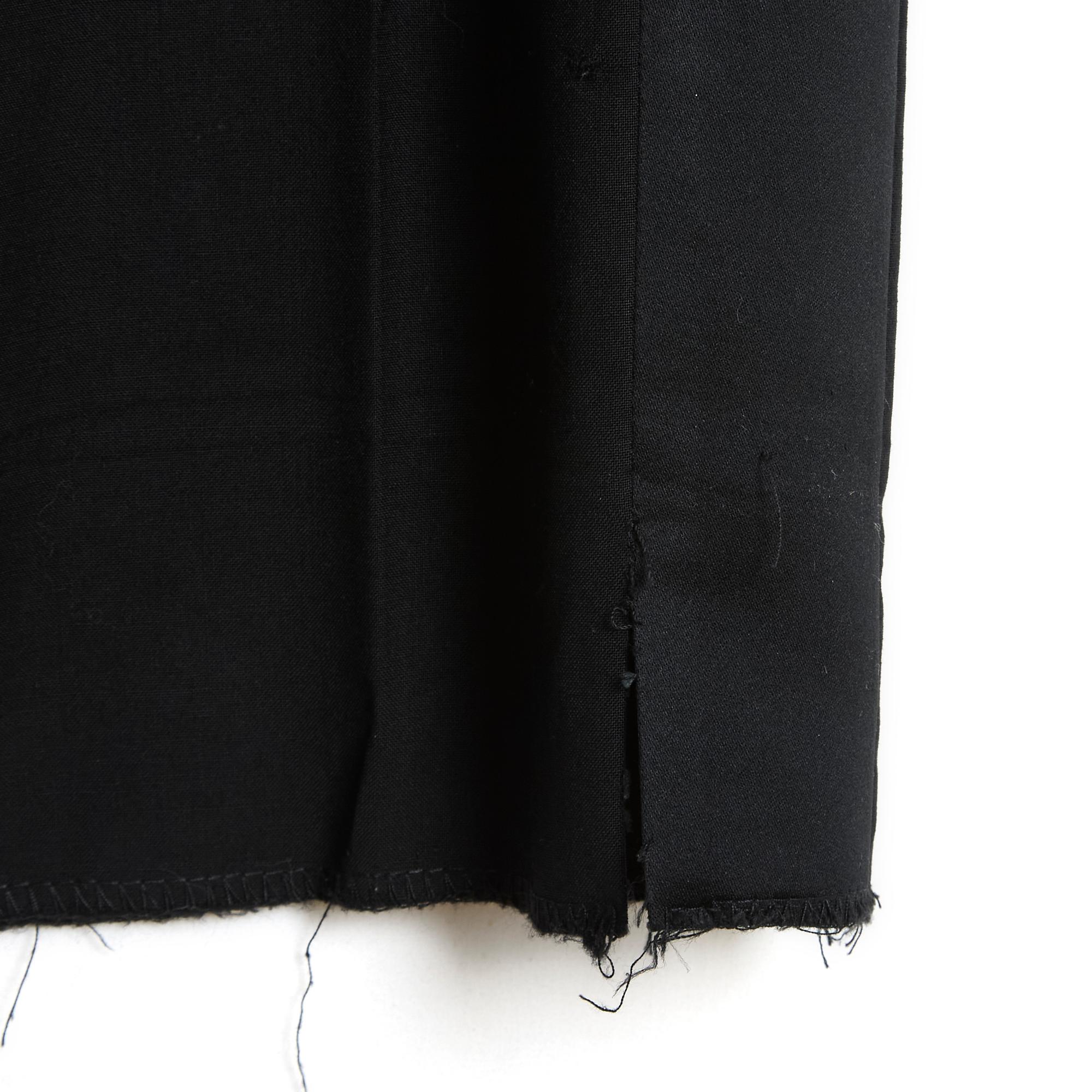 Yves Saint Laurent Rive Gauche YSL straight pants in black wool decorated with a wide black satin band on each side, tuxedo style, 2 slit pockets at the height, 2 slit pockets at the back closed by a button covered in satin, waist closed by a