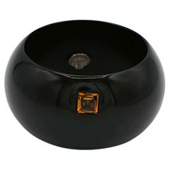YVES SAINT LAURENT Rive Gauche YSL Manschettenarmband aus schwarzem Harz und Kristall
