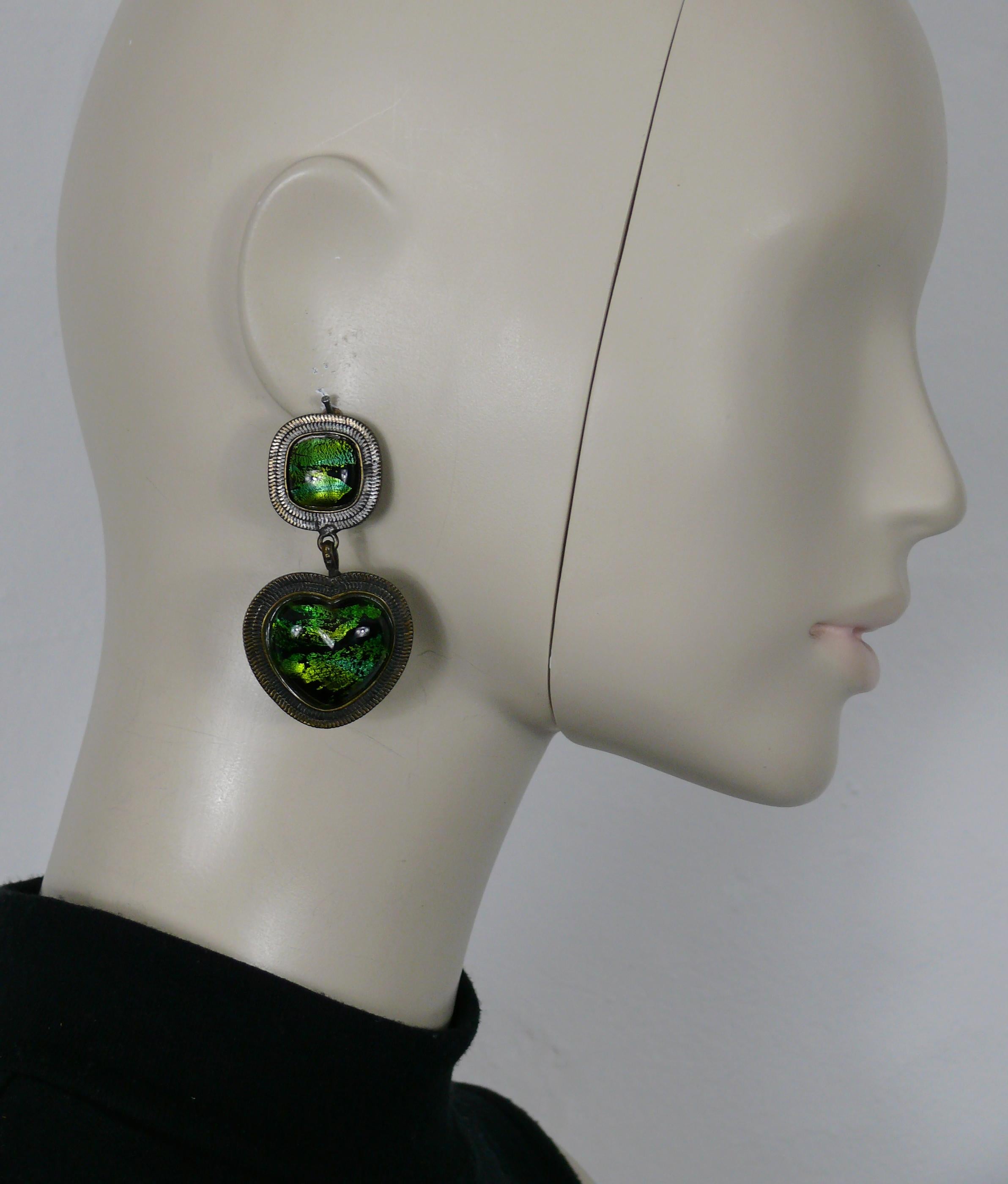 YVES SAINT LAURENT Rive Gauche vintage antiqued bronze tone dangling earrings (clip-on) featuring a heart embellished with black glass cabochons with foil inclusions.

Embossed YVES SAINT LAURENT Rive Gauche Made in France.

Indicative measurements