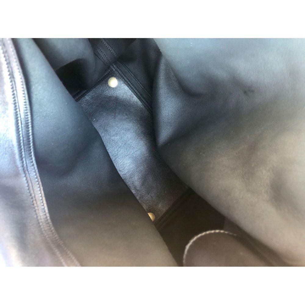 Yves Saint Laurent Roady Leather Handbag in Black In Good Condition In Carnate, IT
