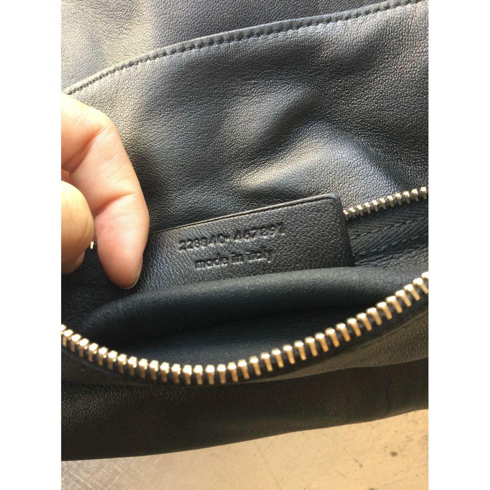 Women's Yves Saint Laurent Roady Leather Handbag in Black