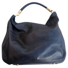 Yves Saint Laurent Roady Leather Handbag in Black