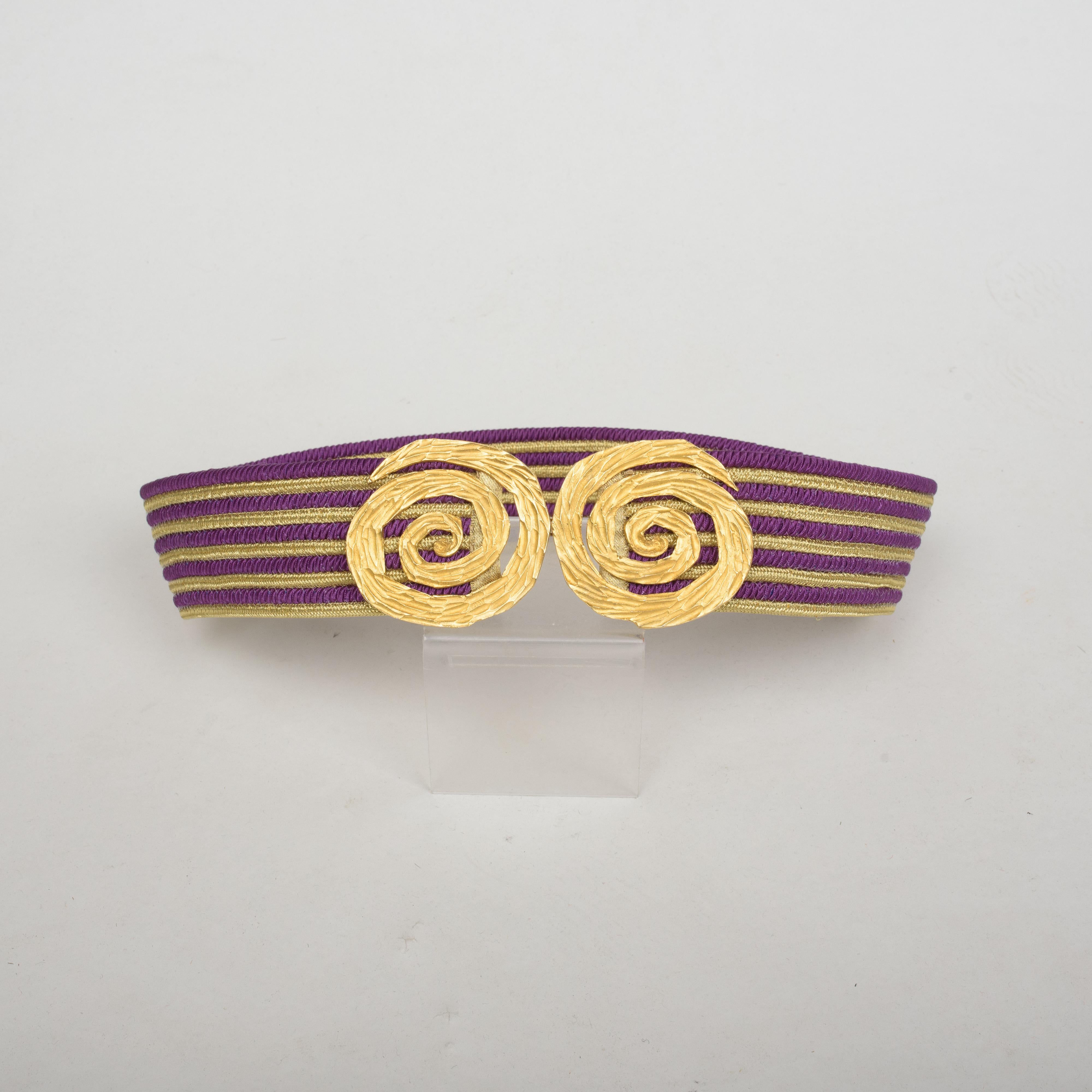 Spring Summer 1991 collection

France

Beautiful collection belt signed Yves Saint Laurent Rive Gauche by the famous parurier Robert Goossens dating from the Spring Summer 1991 collection. Large belt in purple silk trimmings and golden lurex. A