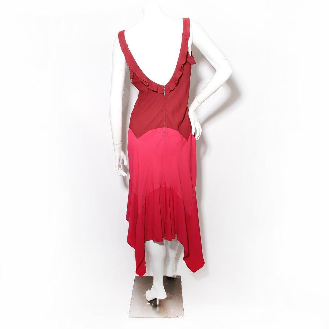 Ruffle dress by Tom Ford for Yves Saint Laurent 
Sleeveless shift dress 
Ruffle detail 
Dipped back 
Asymmetrical hem 
Color block 
Zip back with hook and eye closure 
100% silk
Made in France 
Condition: Good, consistent with age and use. Small