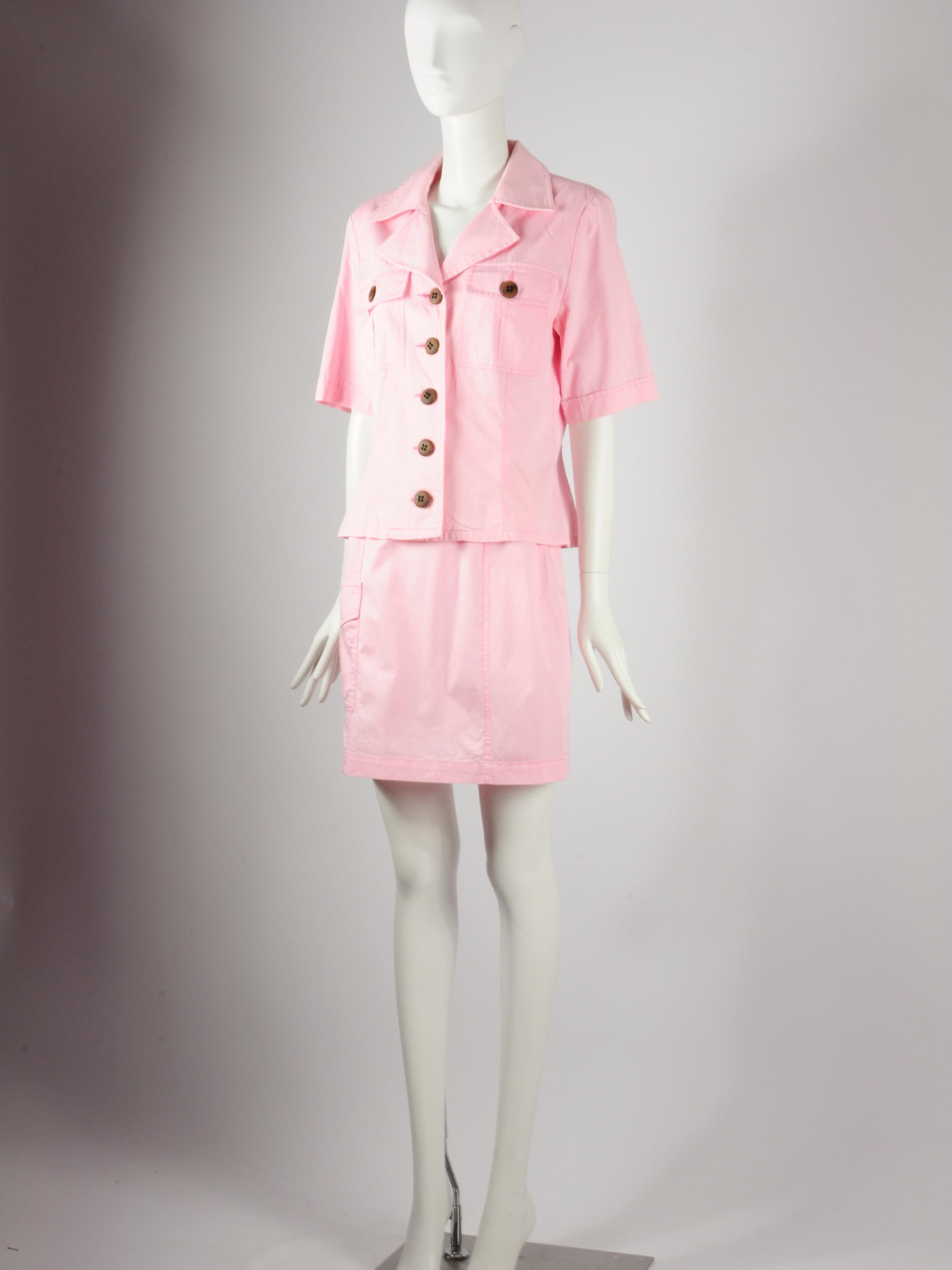 Vintage Yves Saint Laurent saharienne safari inspired two-piece set in baby pink with wooden buttons and big, workwear pockets. The iconic “Saharienne” style was introduced by Yves Saint Laurent in 1967 and was revolutionary. Yves Saint Laurent has