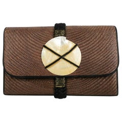 Yves Saint Laurent Muschel-Clutch Tasche