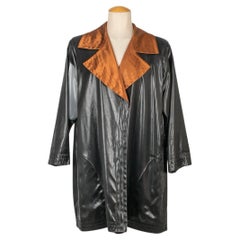 Abrigo negro brillante Yves Saint Laurent, 1995