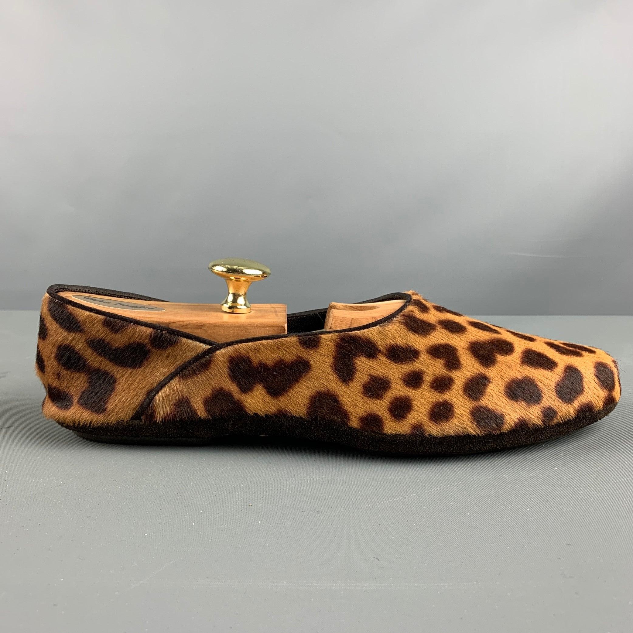 YVES SAINT LAURENT RIVE GAUCHE loafers comes in a brown and tan animal print leather material featuring a slip on style. It does not include shoe trees.
 Made in Italy.
Very Good Pre-Owned Condition. Signs of wear. 

Marked:   40Outsole: 11 inches 