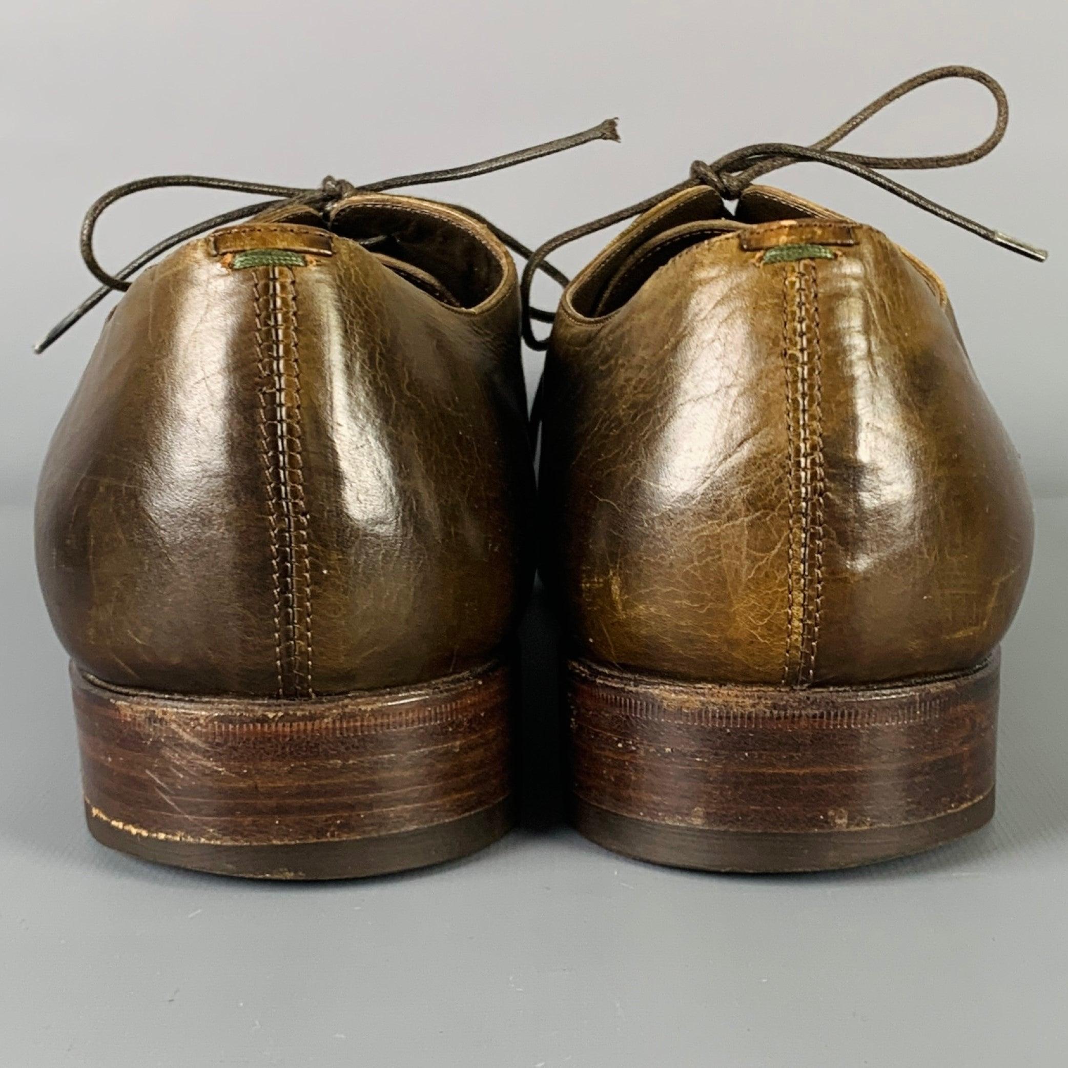 Marron YVES SAINT LAURENT Taille 9 Chaussures à lacets en cuir perforé marron à bout arrondi en vente