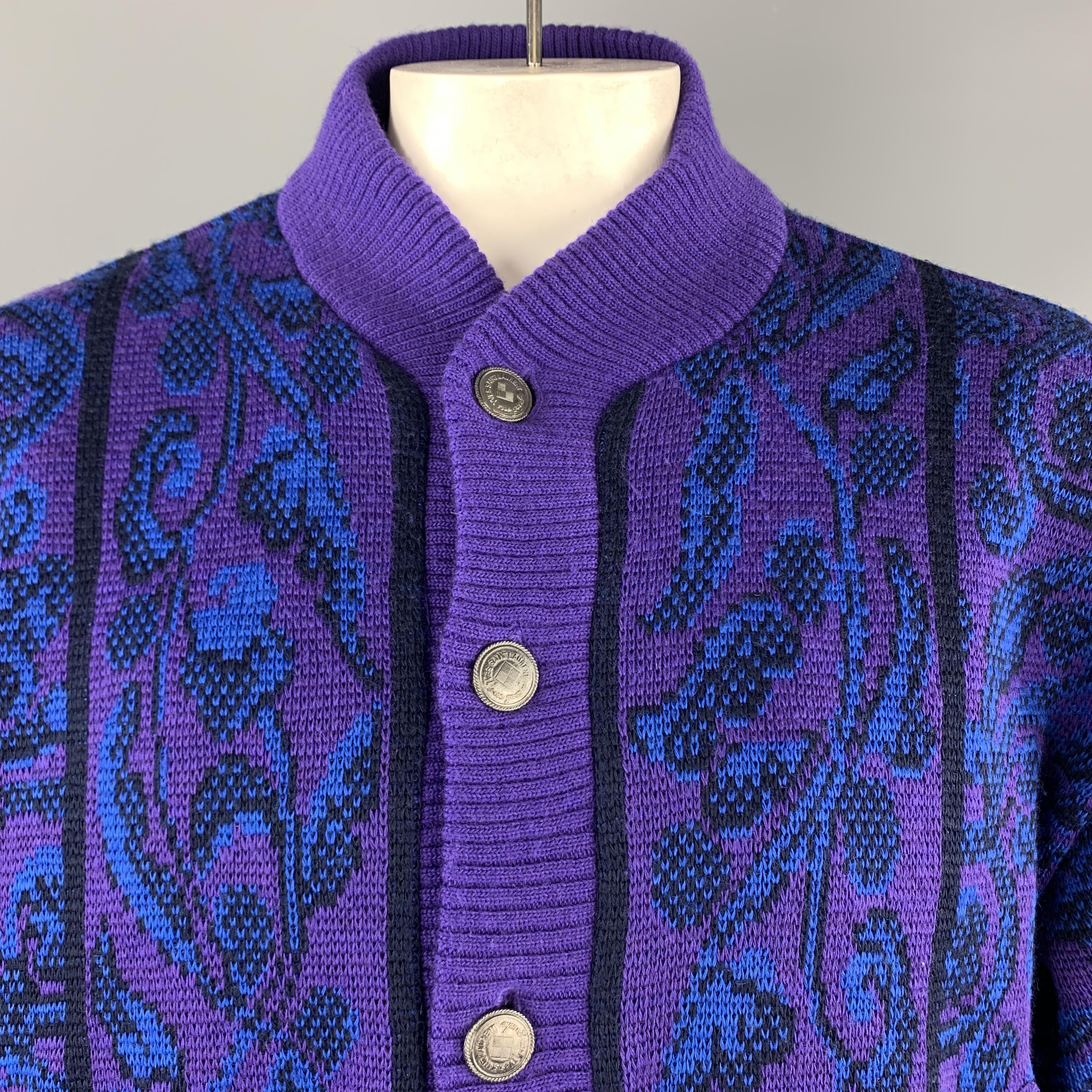 Vintage YVES SAINT LAURENT RIVE GAUCHE cardigan jacket comes in a vibrant purple and blue baroque print wool knit with silver tone embossed button front and quilted liner. Made in France.

Very Good Pre-Owned Condition.
Marked: IT
