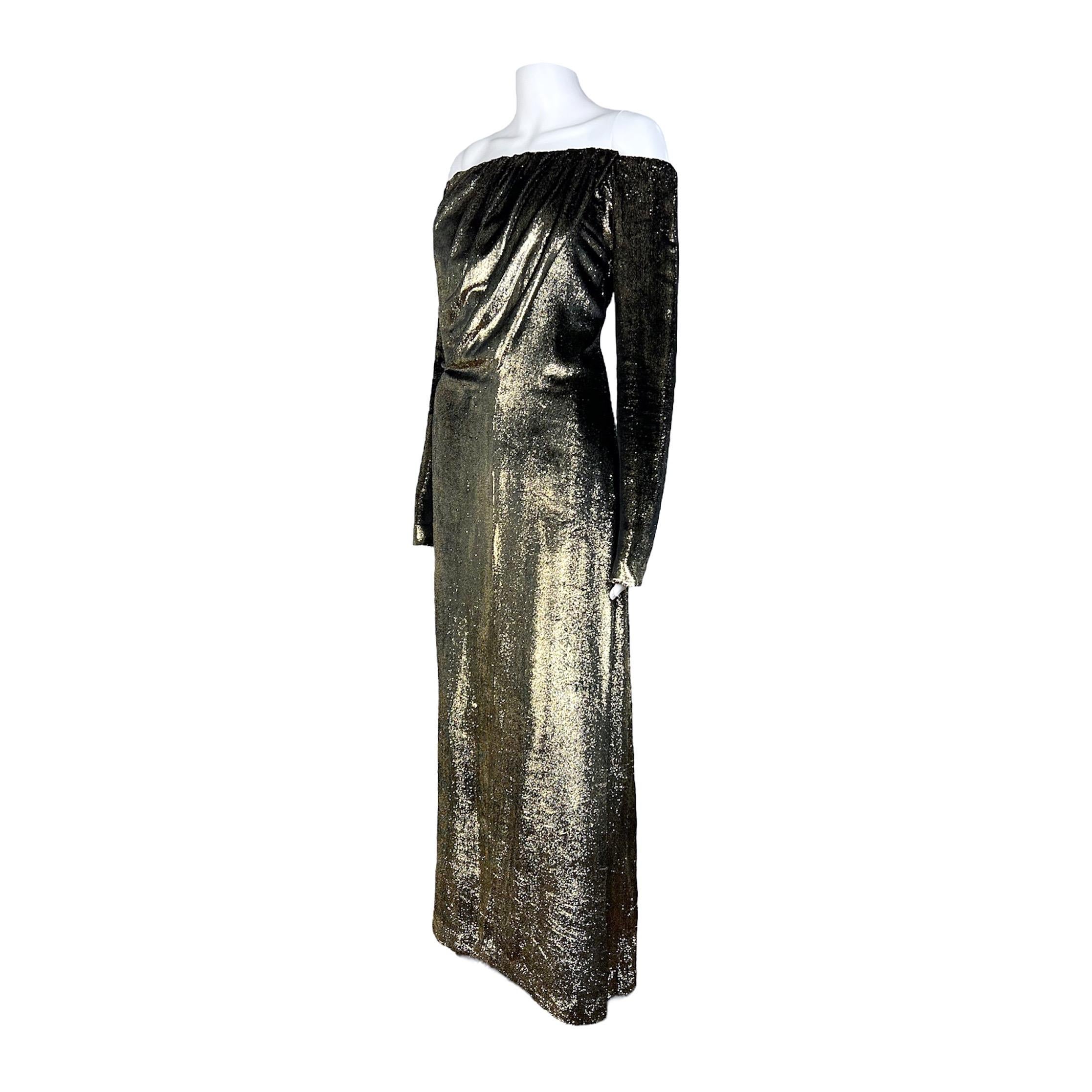 Exquisite and unparalleled, behold this mesmerizing Yves Saint Laurent gold lamé gown from the esteemed Spring Summer 1989 collection. Delicately resting off the shoulder, it gracefully cascades, adorning the bust with masterful drapery. Enhanced by