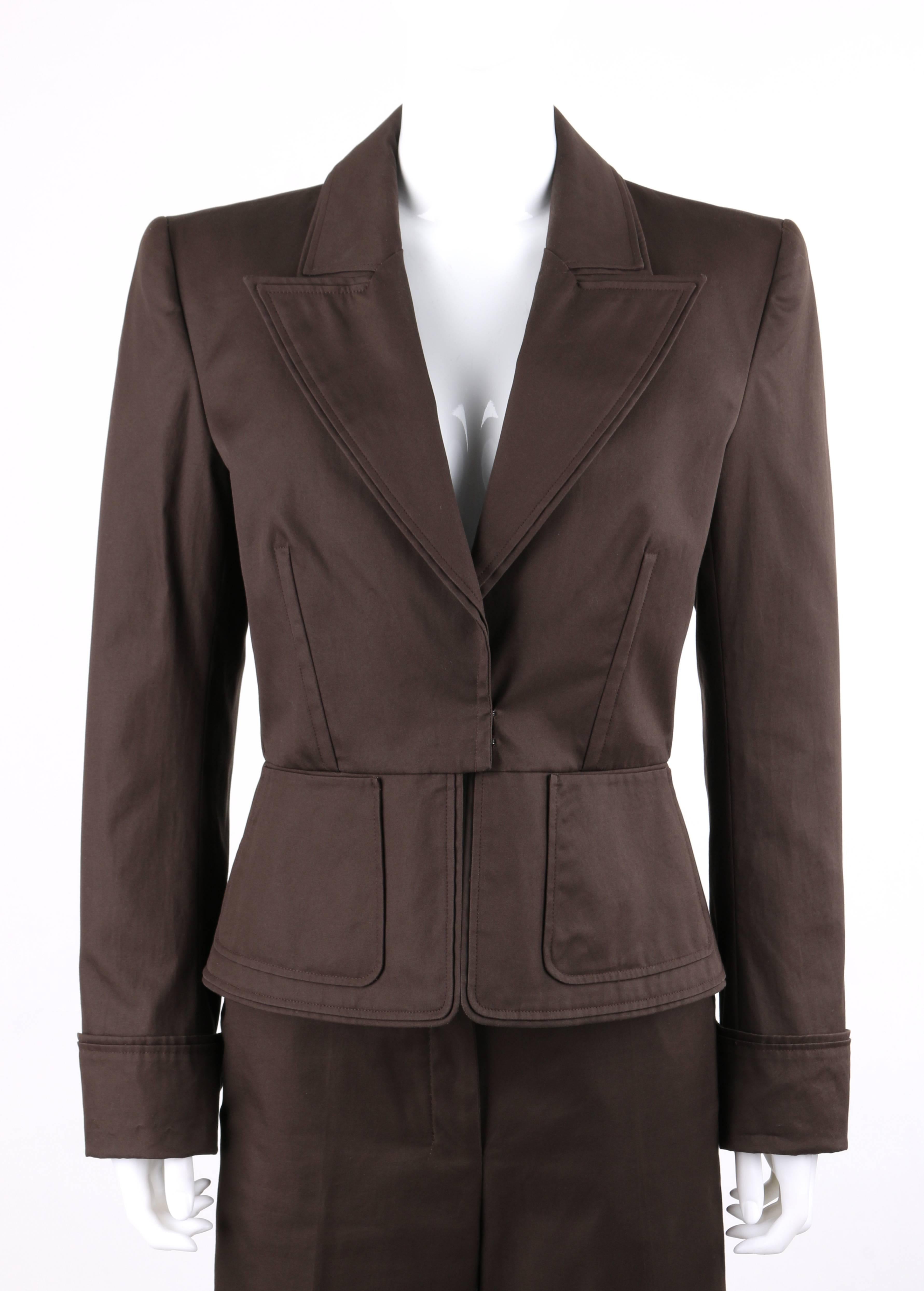 Yves Saint Laurent Spring/Summer 2003 YSL two piece brown (with a hint of olive) peplum blazer pants suit set. Designed by Tom Ford. Wide peak double layered lapel collar. Long sleeves with slit at cuff. Four center front concealed hook and eye