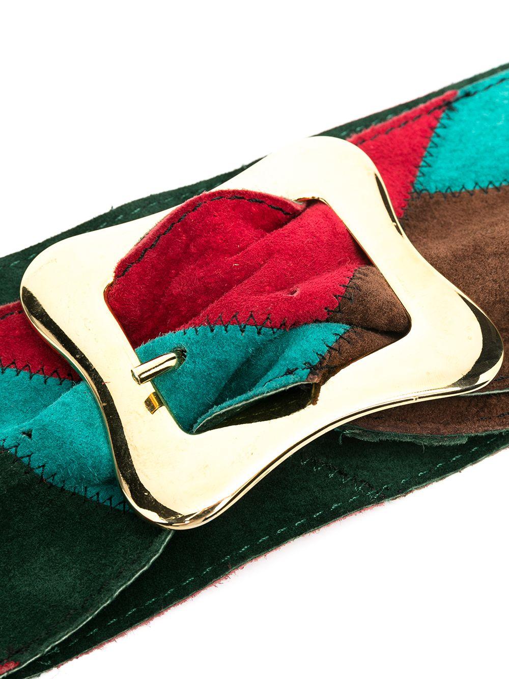 Shaded in bright autumnal tones of jade, red, forest green, brown and gold, this vintage Yves Saint Laurent belt was designed during the 1980s, when Saint Laurent was still at the helm of the brand. This belt exudes Saint Laurent's typically