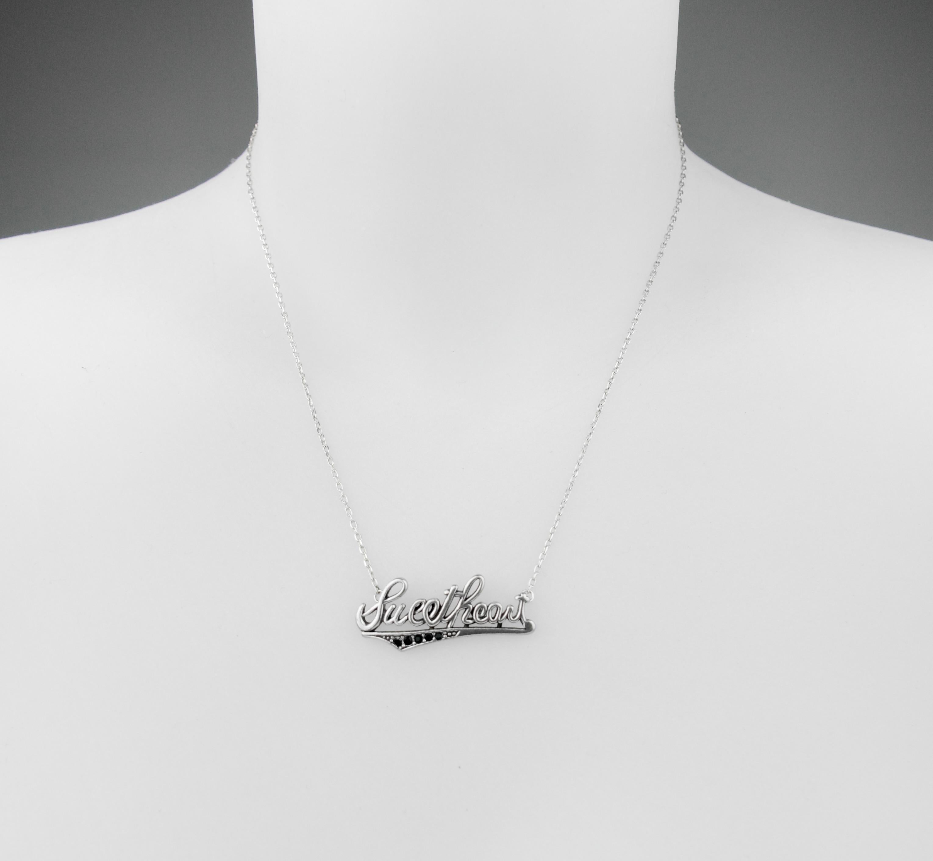 Bellissima collana pop in argento di Yves Saint Laurent con ciondolo 