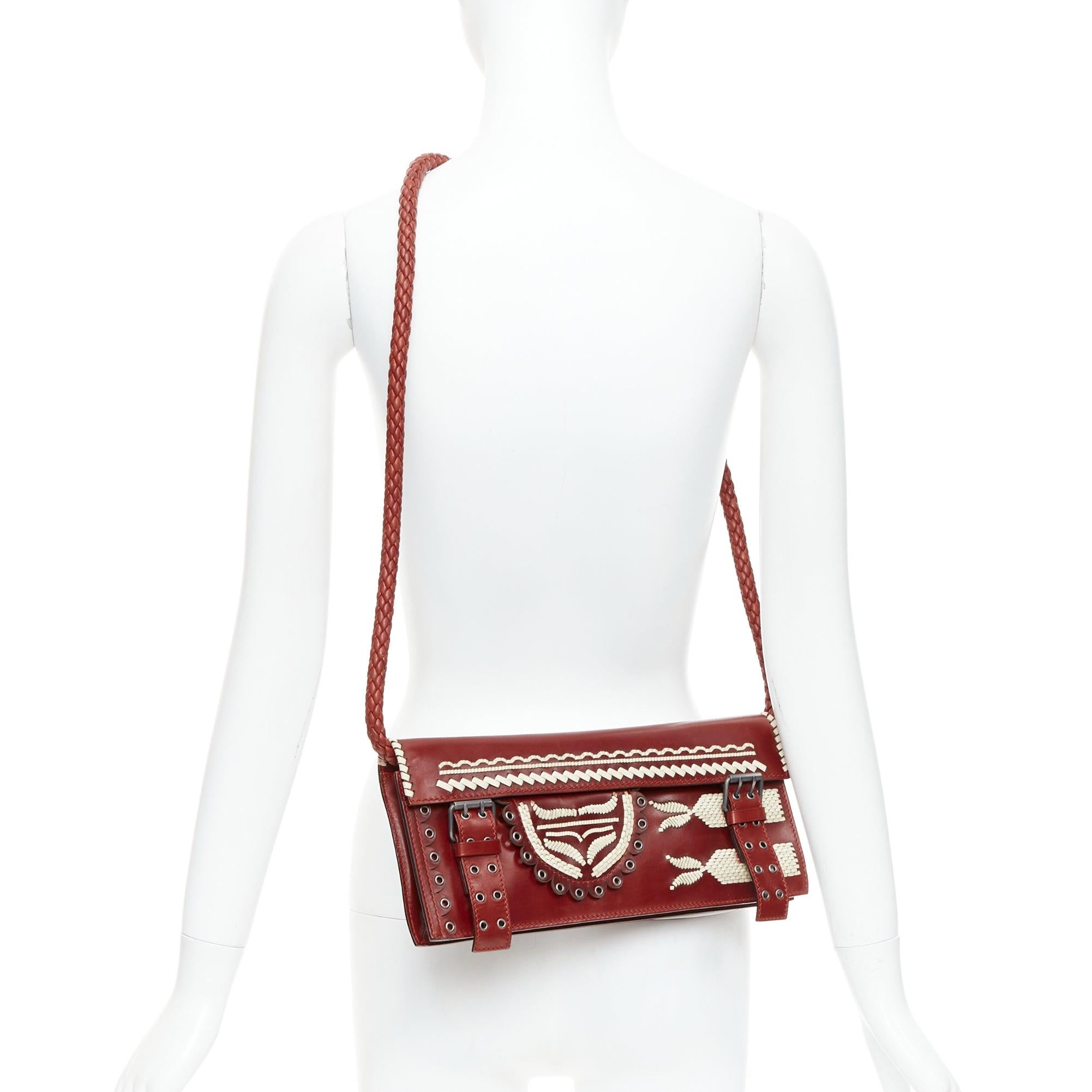 YVES SAINT LAURENT Tom Ford Vintage red calfskin woven applique shoulder bag
Reference: TGAS/E00161
Brand: Yves Saint Laurent
Designer: Tom Ford
Material: Leather
Color: Red, Cream
Pattern: Solid
Closure: Snap Buttons
Lining: Brown Leather
Extra
