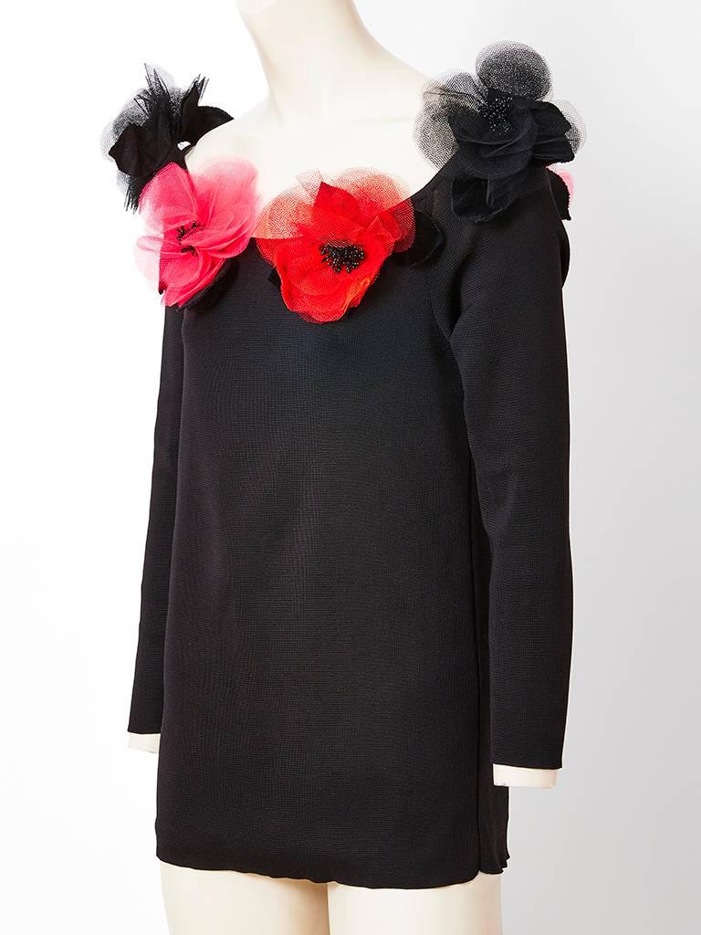 Yves Saint Laurent, Rive Gauche, silk jersey knit tunic, having a scoop neck, embellished with red organza poppy flowers and black tulle flowers at the shoulders.
