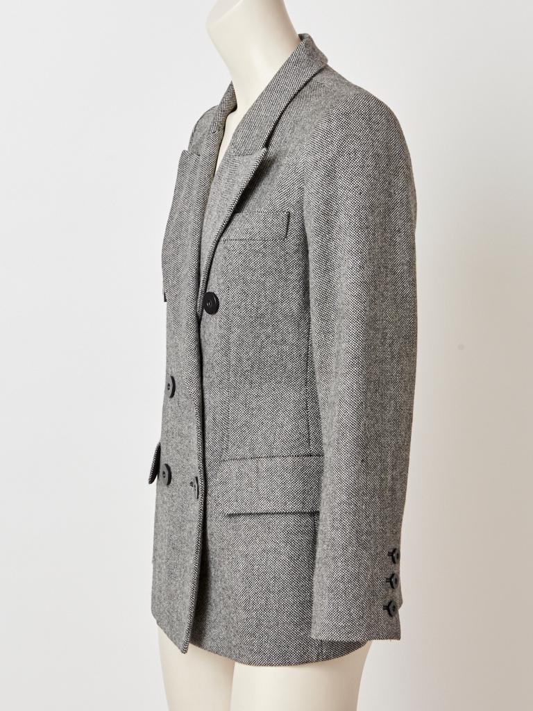 Alber Elbaz, for Yves Saint Laurent, Rive Gauche, salt and pepper, wool tweed, double breasted blazer having flap pockets and a semi fitted silhouette.