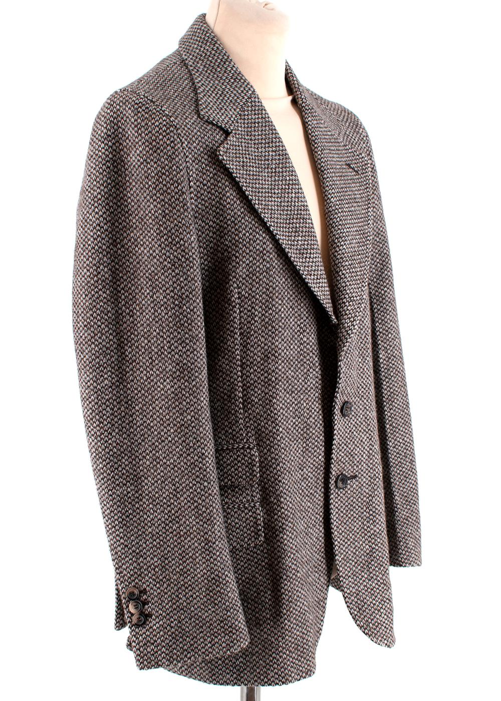 Yves Saint Laurent Mens Tweed Blazer

- Rive Gauche collection .      
- Thick blend of wool 
- Two tone cream and brown weave
- Tortoise shell shiny buttons
- Revere collar
- Mens size 50 Regular
- Smaller tortoise buttons on the cuffs
- YSL