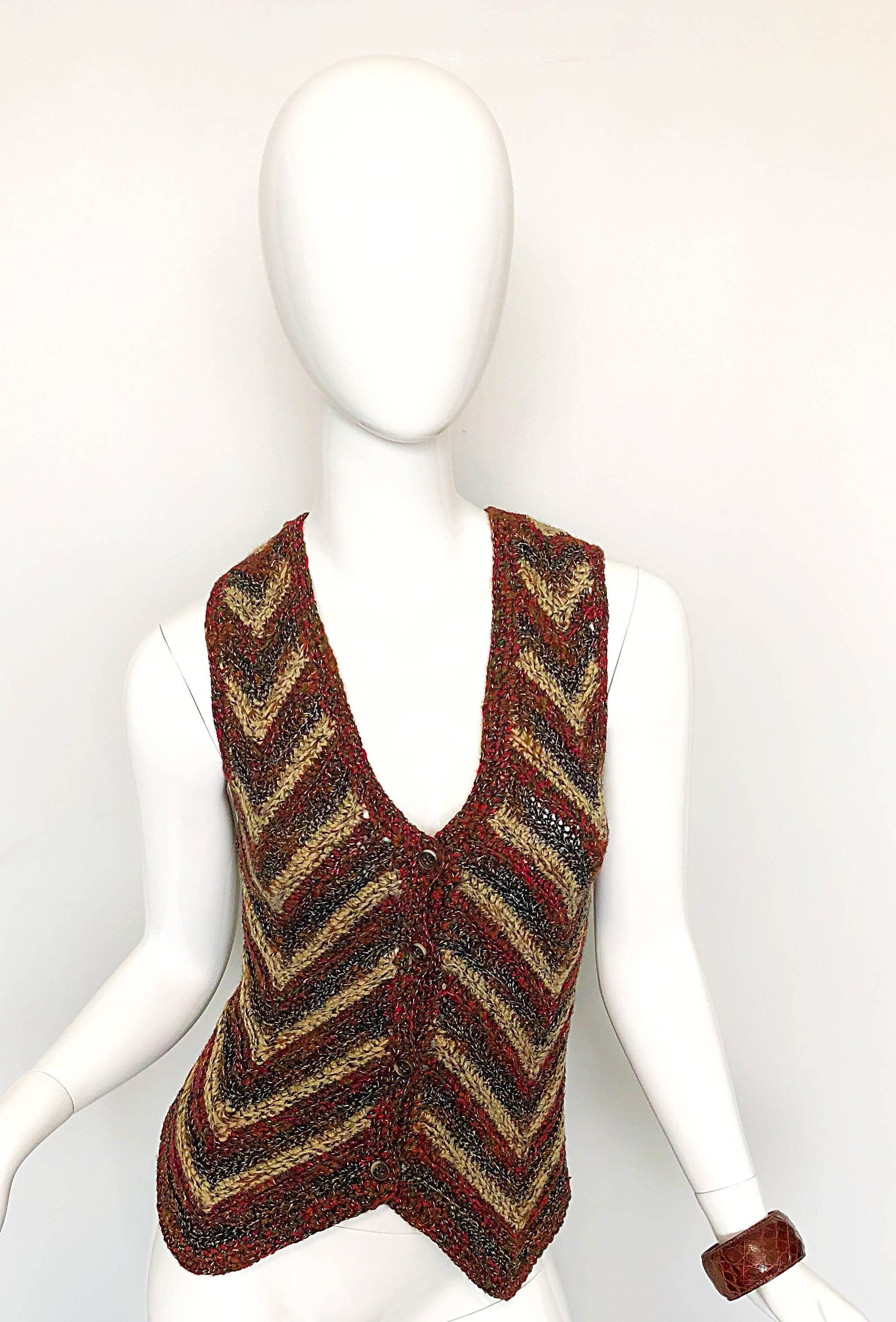 Wonderful vintage YVES SAINT LAURENT 'Rive Gauche' wool sweater vest cardigan from the infamous Russian Collection in 1976! Features warm tones of red, brown, tan, green and orange in a chevron striped pattern. Buttons up to bodice with scalloped