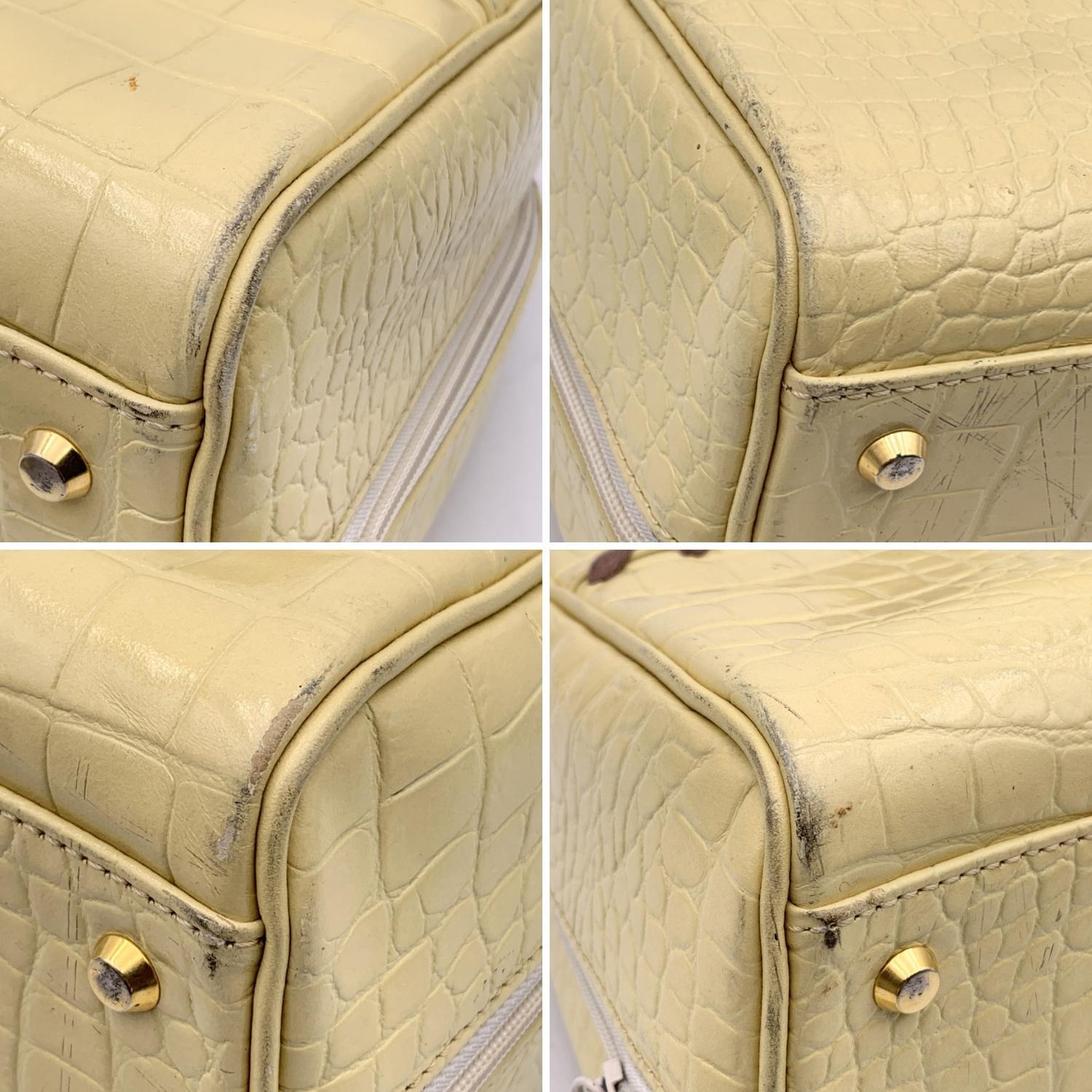 Yves Saint Laurent Vintage Beige Embossed Leather Bowling Bag 1