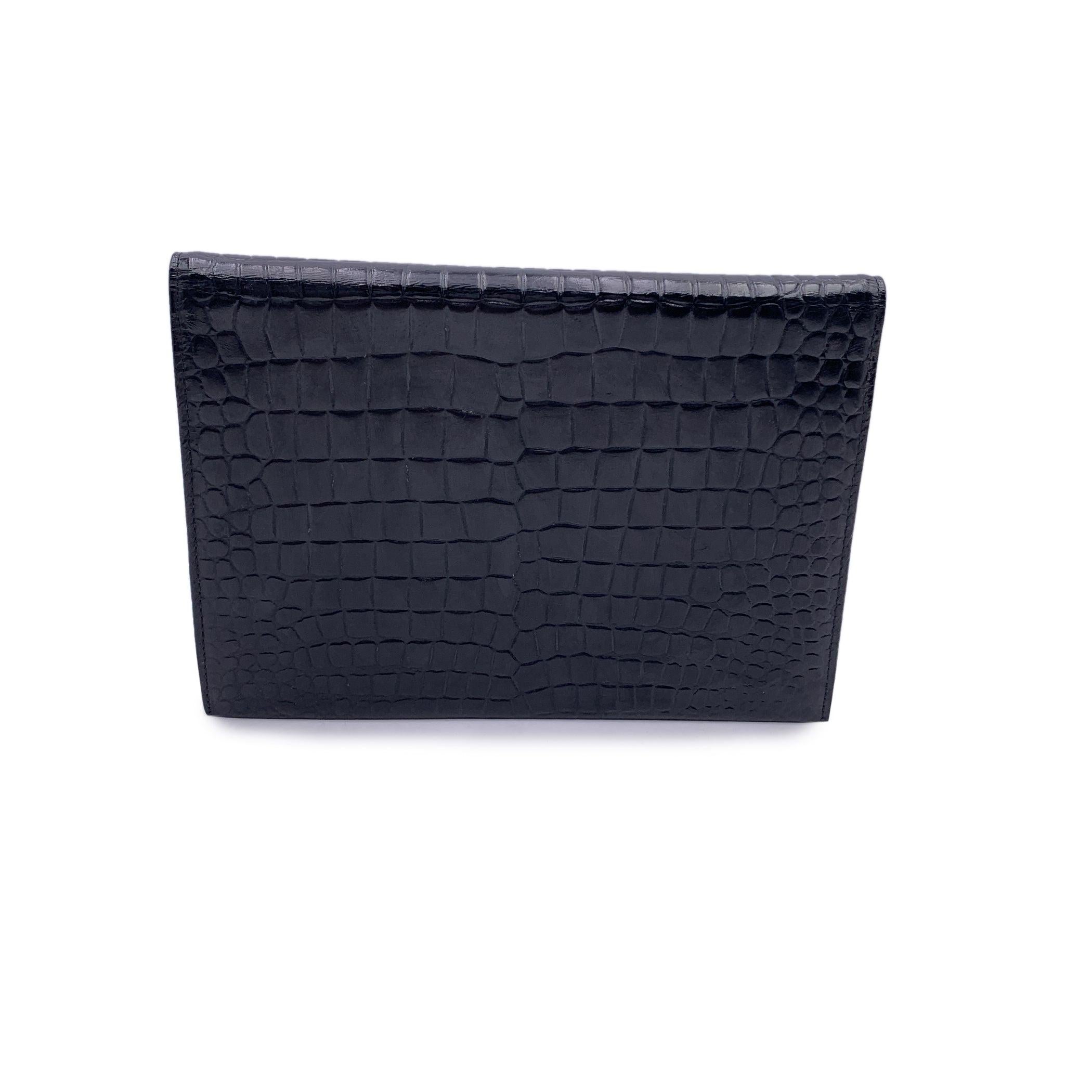 Yves Saint Laurent Vintage Black Embossed Asymmetric Clutch Bag In Excellent Condition In Rome, Rome