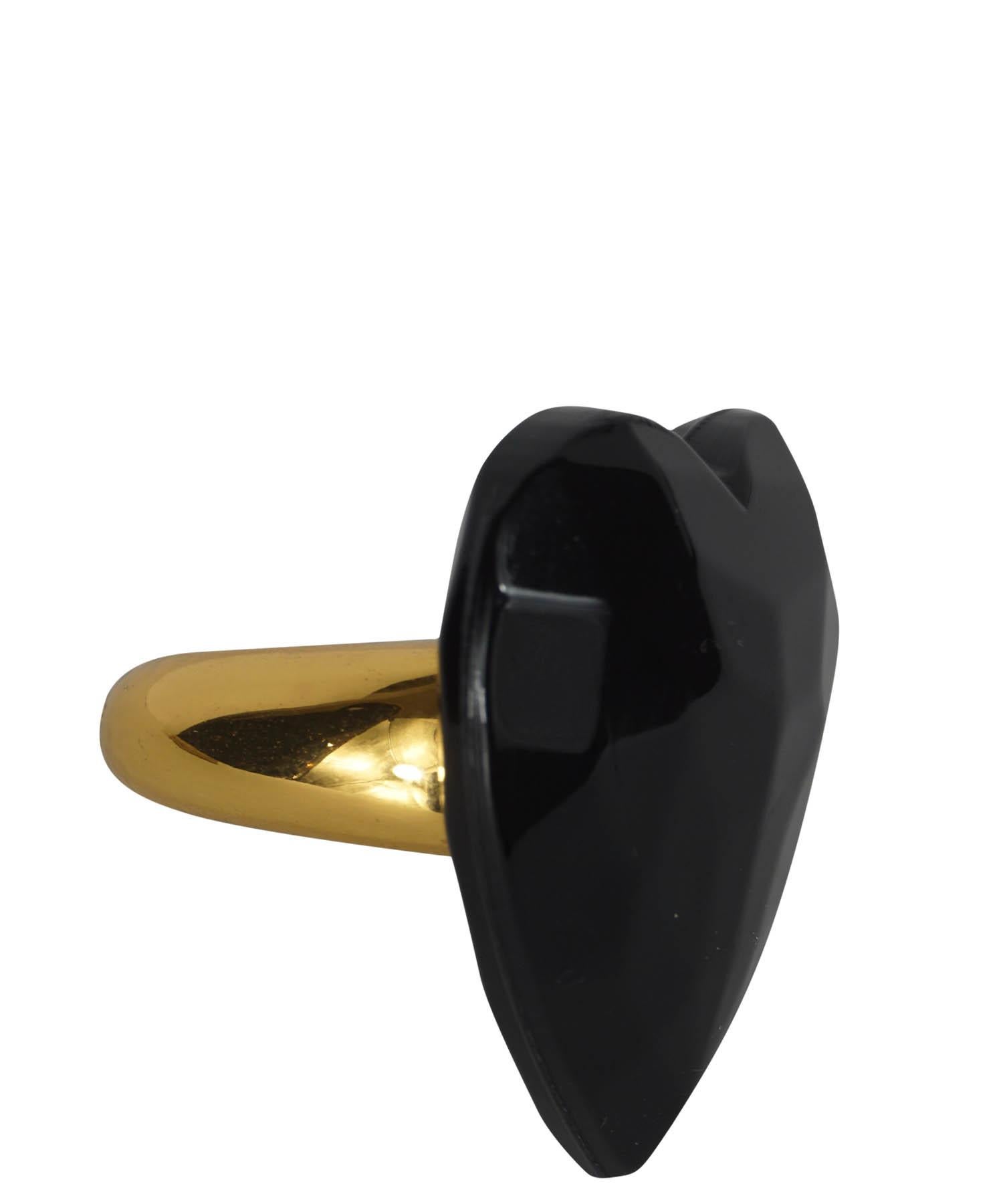 Yves Saint Laurent vintage statement ring, dating back to the 1980's, features a massive black faceted resin heart on a thick gold-tone band. Designer size 7. Made in France. Heart width: 1.5