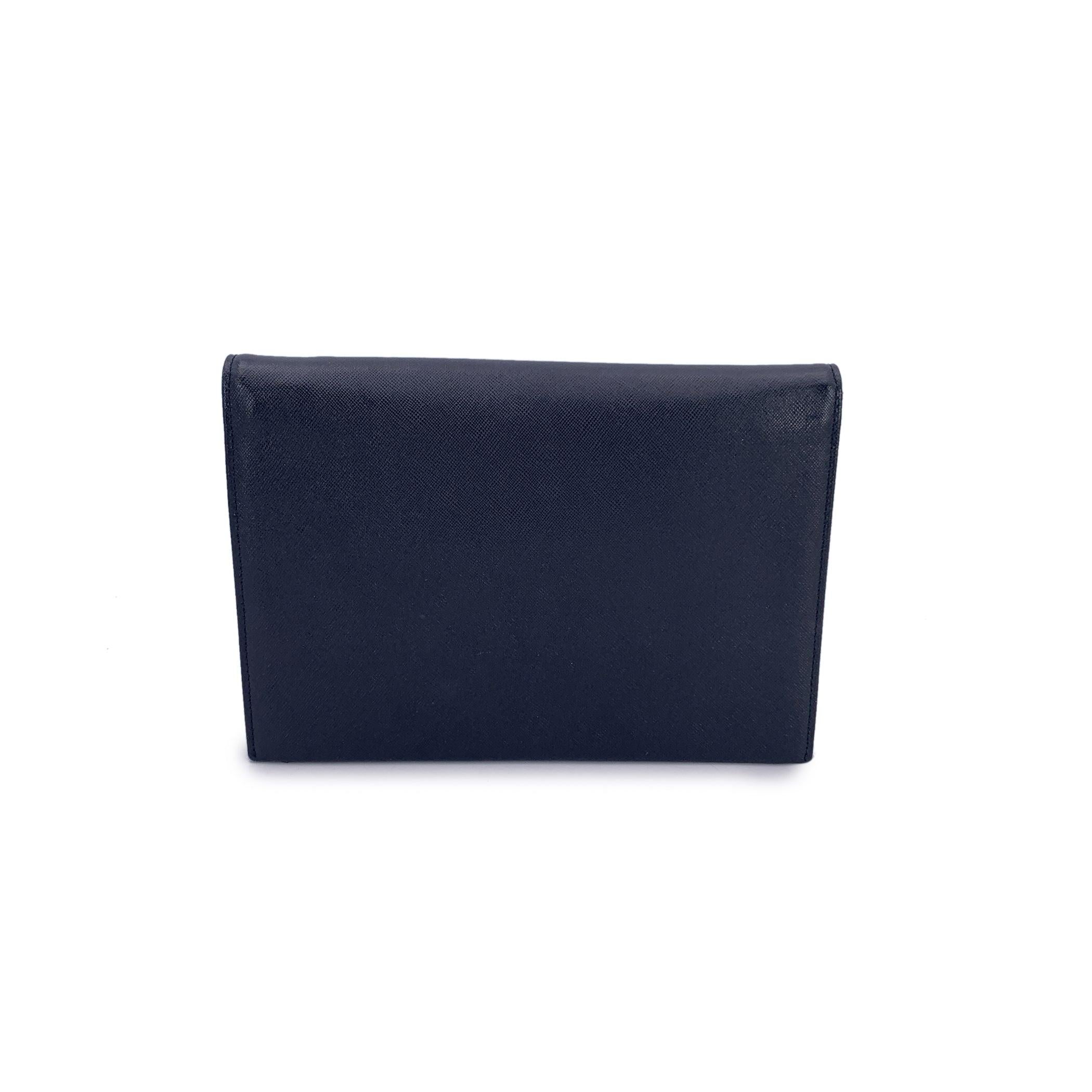 Yves Saint Laurent Bolso de mano asimétrico vintage de piel negra en Excelente estado para la venta en Rome, Rome