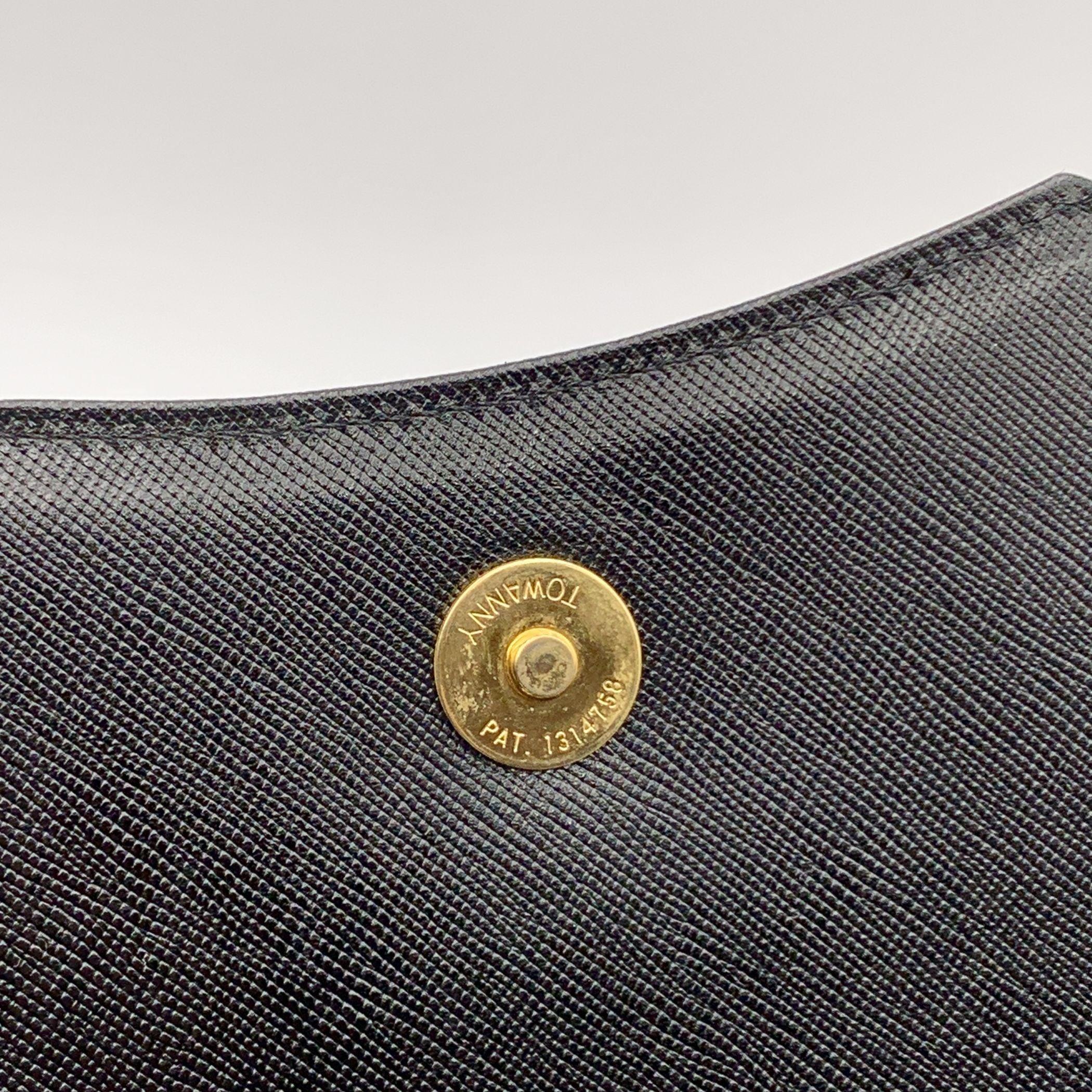 Yves Saint Laurent Vintage Clutch aus schwarzem Leder mit YSL-Logo Damen