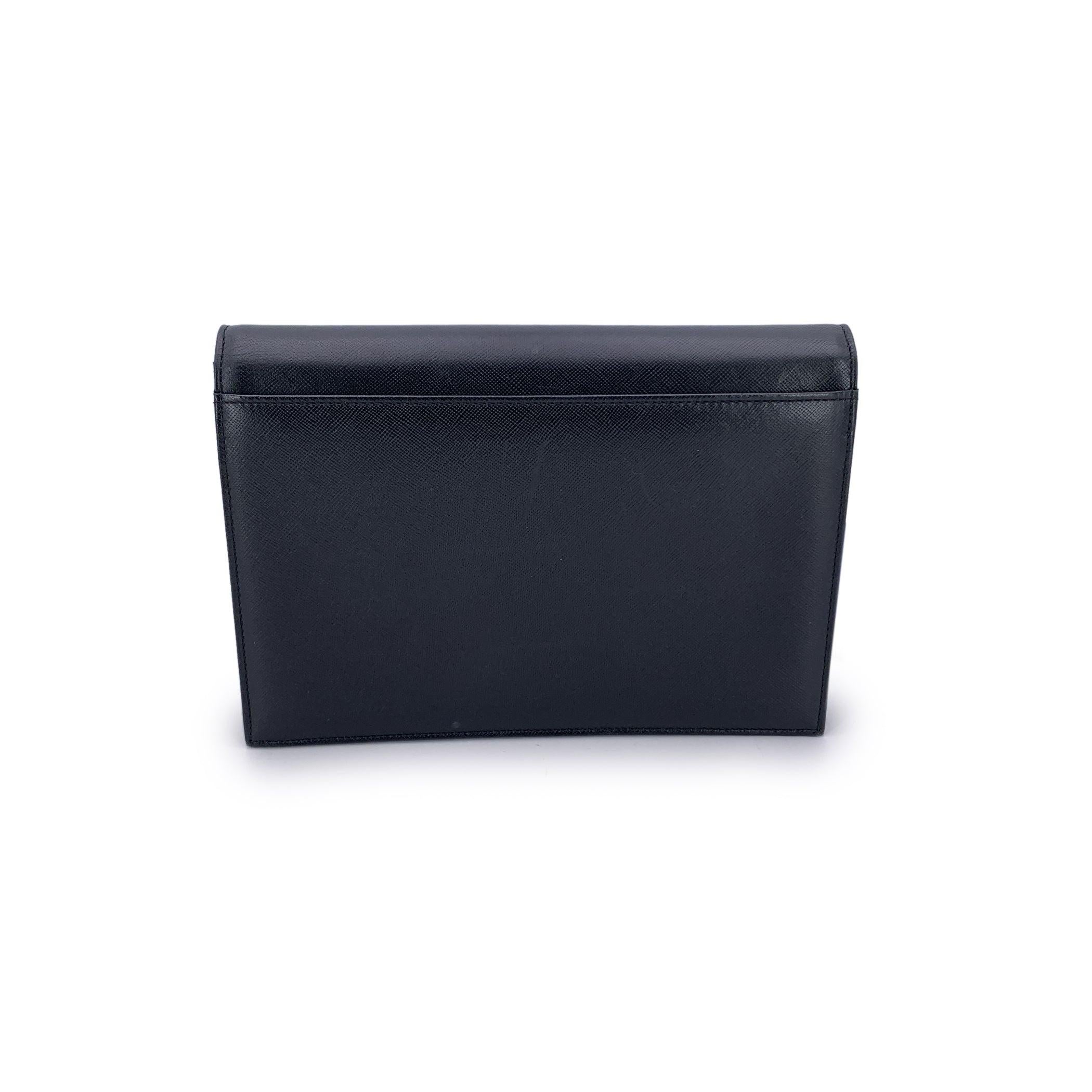 Yves Saint Laurent Vintage Black Leather YSL Logo Flap Clutch Bag (Schwarz) im Angebot