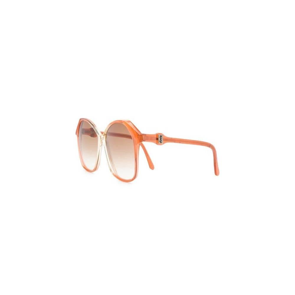 Yves Saint Laurent light orange-brown transparent acetate 70s sunglasses. Brown shaded lenses.

Width: 14 cm
Height: 5,5 cm

Product code: A8266

Notes: Please note this item cannot be shipped to the US.

Composition: Acetate

Made in: