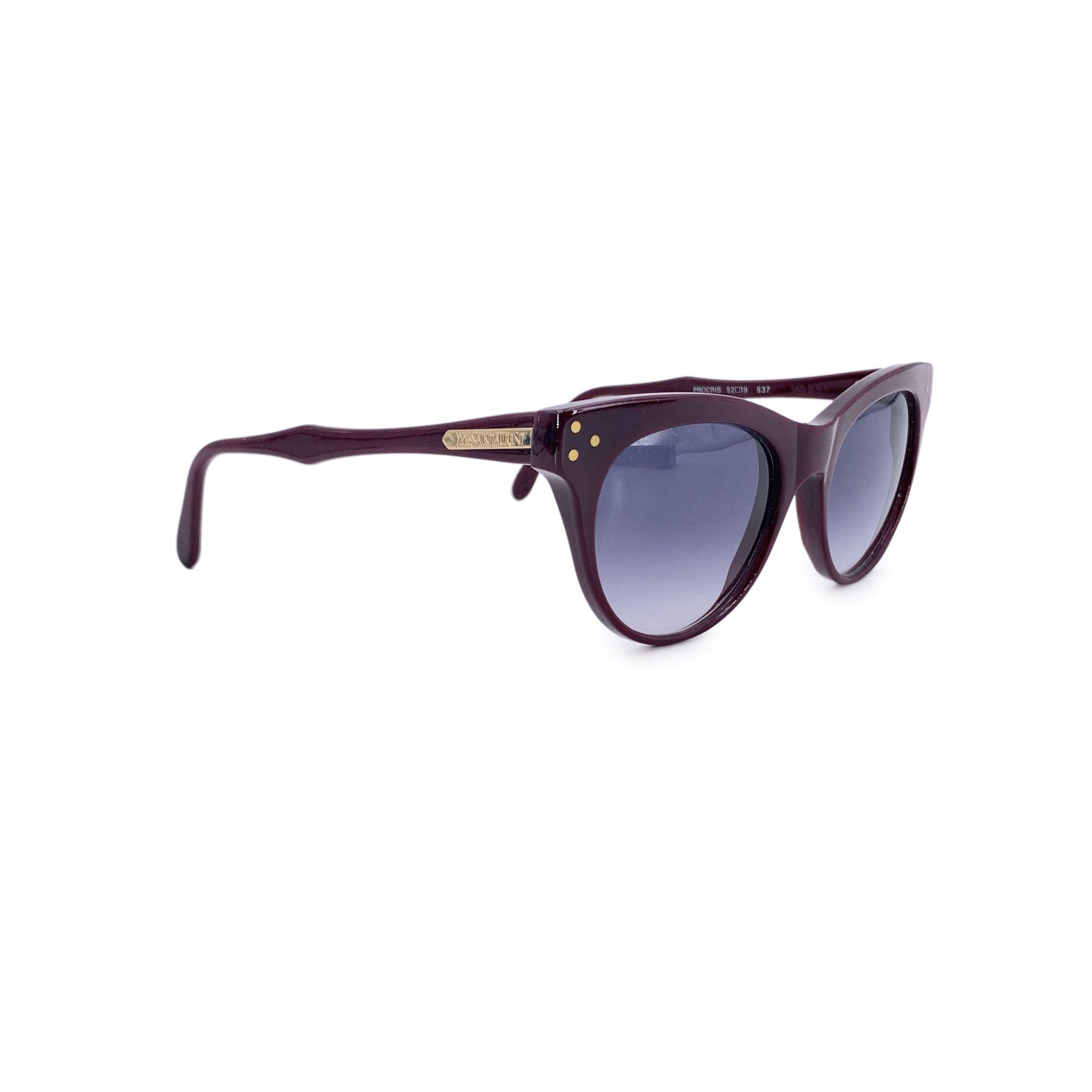 With a name like Procris, these Yves Saint Laurent Vintage Burgundy Sunglasses invite intrigue from the very first glance. Crafted in France during the expressive fashion decade of the 1980s, this rare model is a quiet masterpiece-where myth,