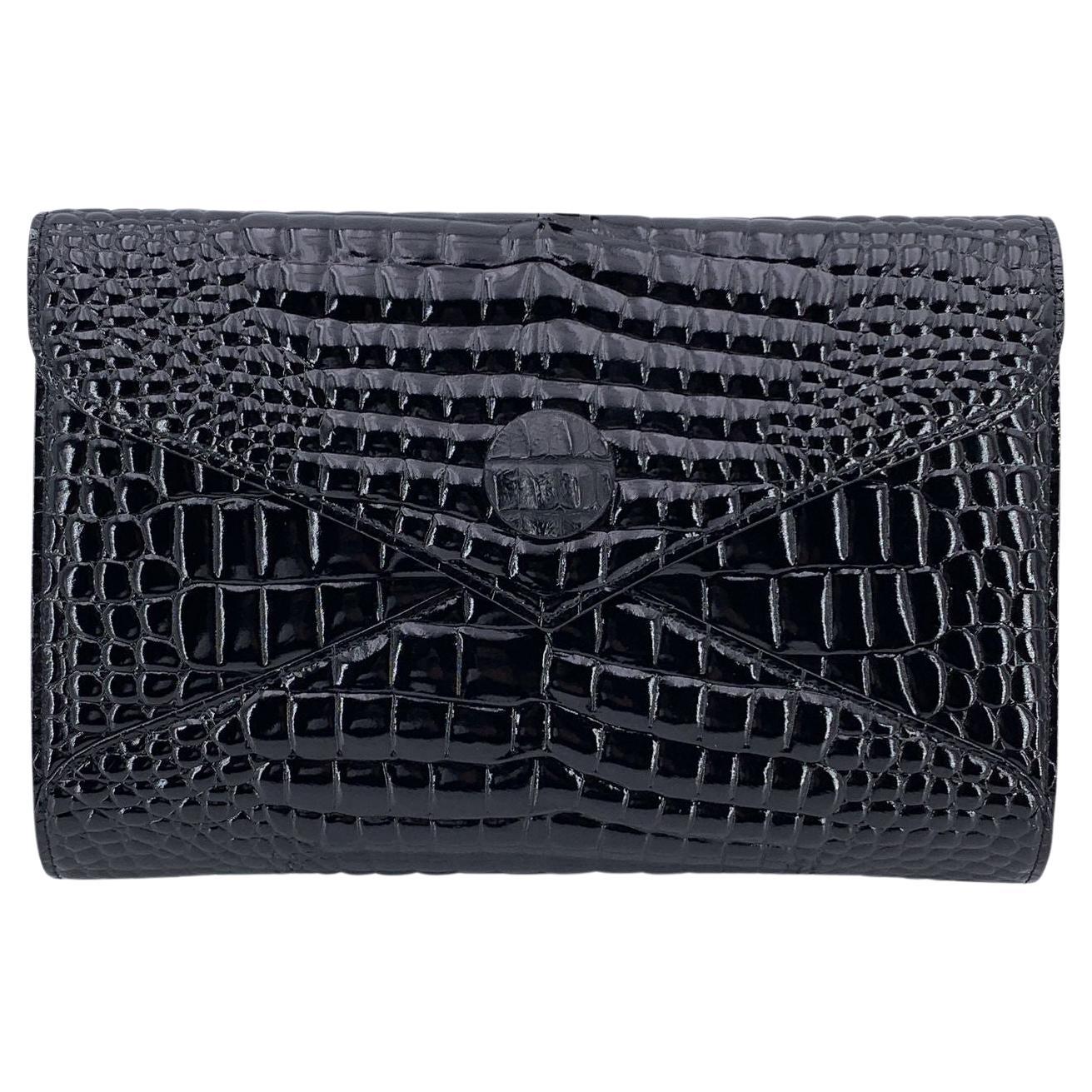 Yves Saint Laurent - Pochette in vernice nera goffrata vintage in vendita
