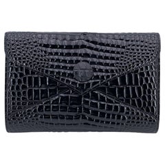 Yves Saint Laurent - Pochette in vernice nera goffrata vintage