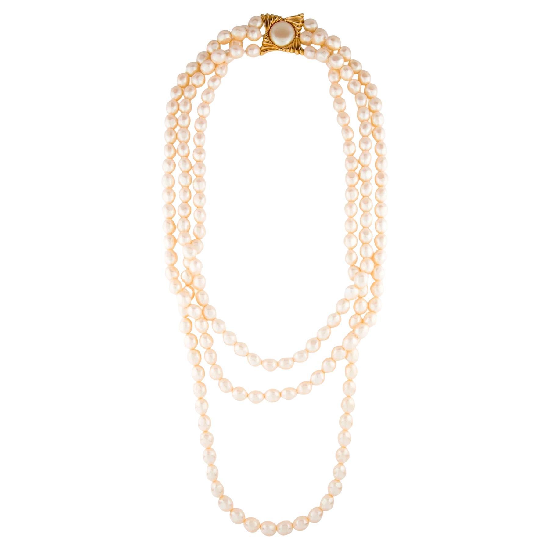 Collier multi-brins Yves Saint Laurent vintage en fausses perles en vente