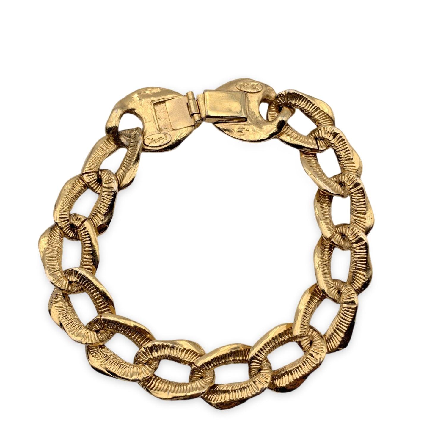 Vintage Yves Saint Laurent gold metal chain link bracelet. Box closure. Max chain length: about 7 inches - 17.8 cm. Retail price is 580 Dollars Condition A - EXCELLENT Gently used. Please, look carefully at the photos and ask for any detail. Details