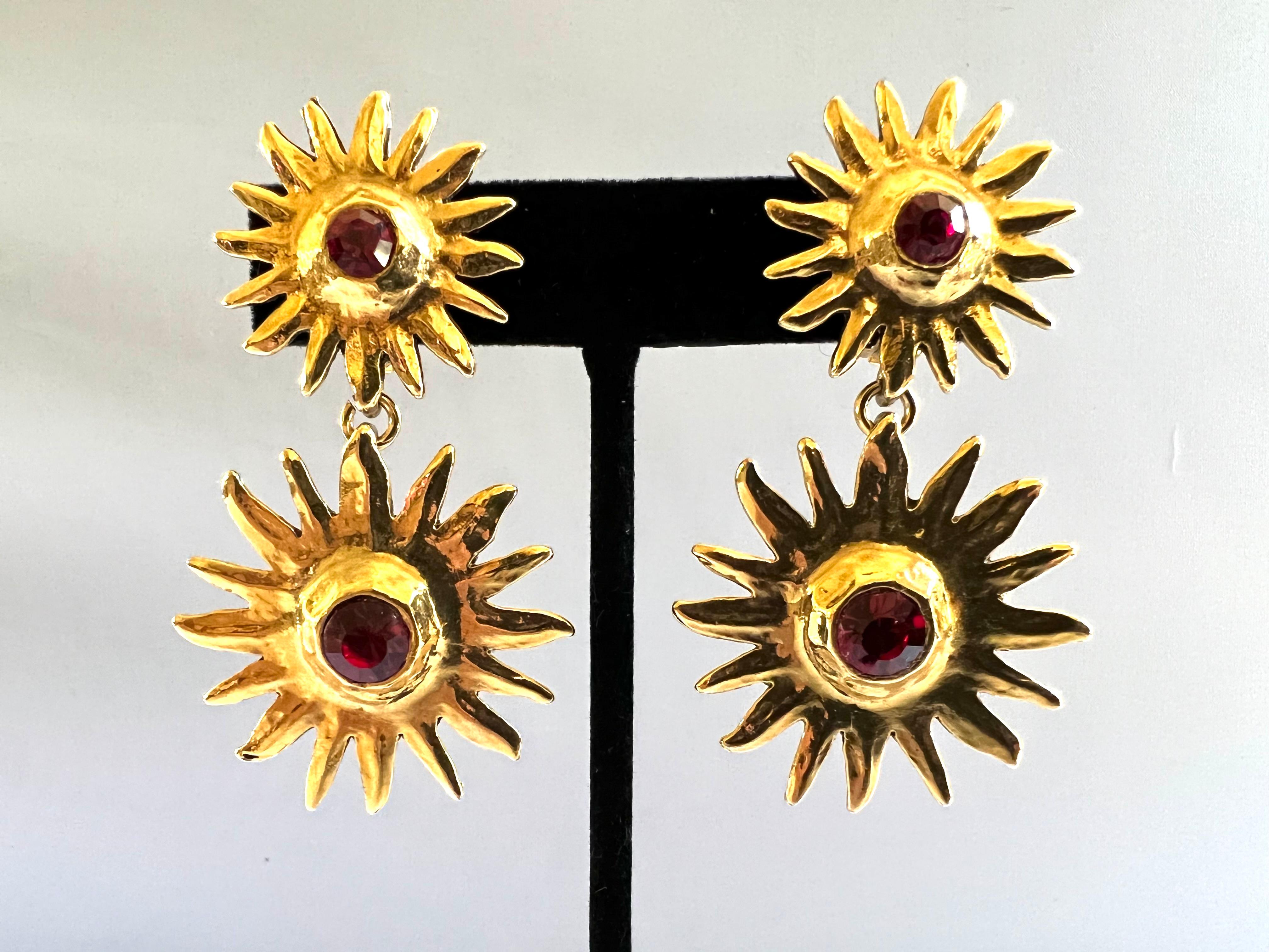Vintage Yves Saint Laurent gilt metal sun earrings with red accents by Maison Robert Goossens for Yves Saint Laurent.