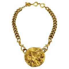 YVES SAINT LAURENT Vintage Gold Tone Mythological Creature Medallion Necklace