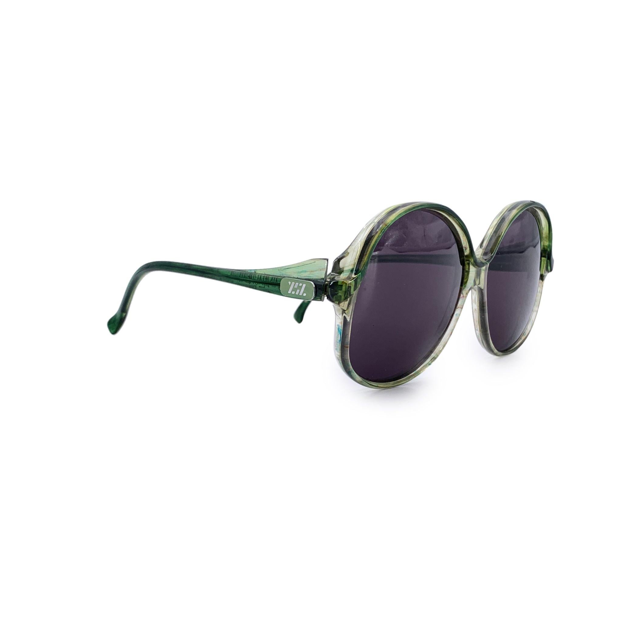 From the heart of 1980s Parisian fashion, the Yves Saint Laurent Vintage Rose DIETILLA Sunglasses are a soft-spoken statement in bold elegance. Made in France and crafted from durable plastic, these women's sunglasses capture the balance between