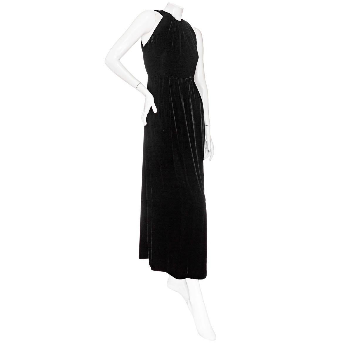 Yves Saint Laurent Vintage Haute Couture Black Velvet Halter Dress

Vintage; circa 1960s
Black
Velvet
Round gathered halter neckline with hook and eye fastening
Fitted bodice
Maxi length
Made in France
No fabric composition label; likely silk or