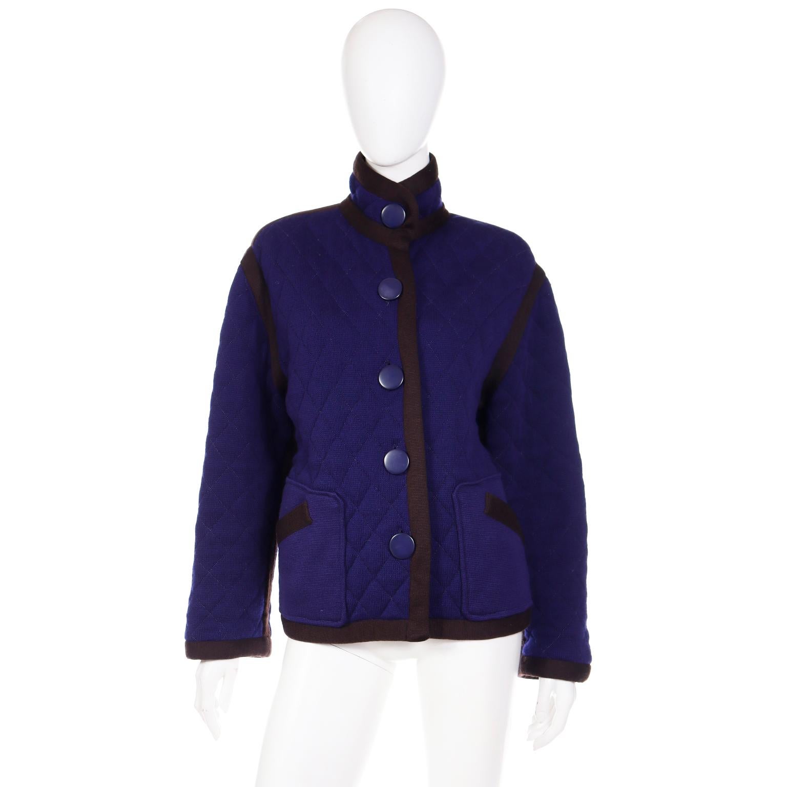 This fabulous vintage Yves Saint Laurent Rive Gauche royal blue quilted jacket is fully reversible to a dark plum purple. Both sides of this fab YSL jacket have slash pockets and large round blue button closures.  Labeled Saint Laurent Rive Gauche