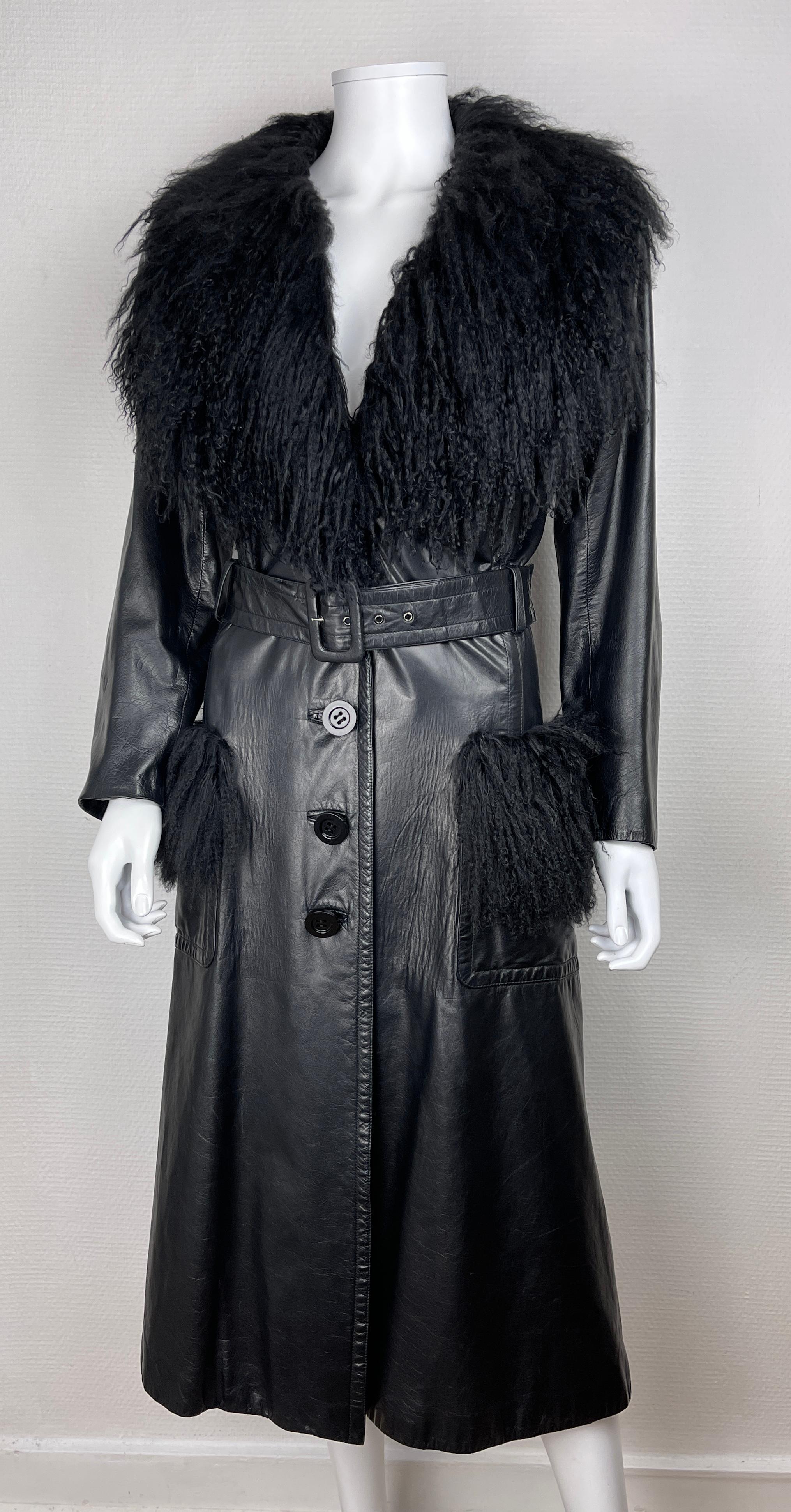 YVES SAINT LAURENT, Made in France, circa 90's. 
Beautiful leather trench with mongolian lamb fur ornements on collar and pockets. 
Unfortunately the leather has wrinkles near to the pockets dur to the weight of lamb. 
Note that they are extremely