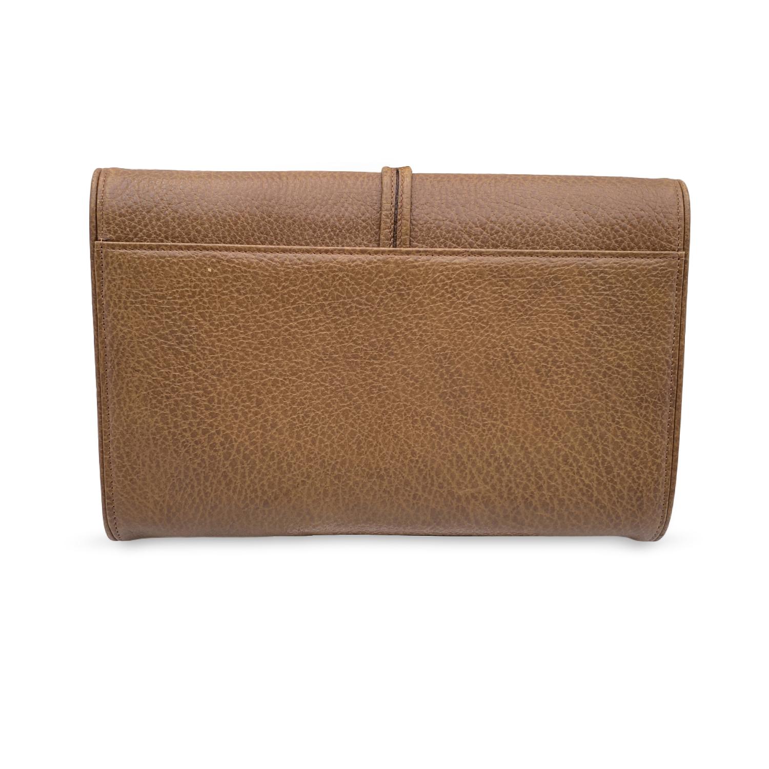 light brown clutch bag