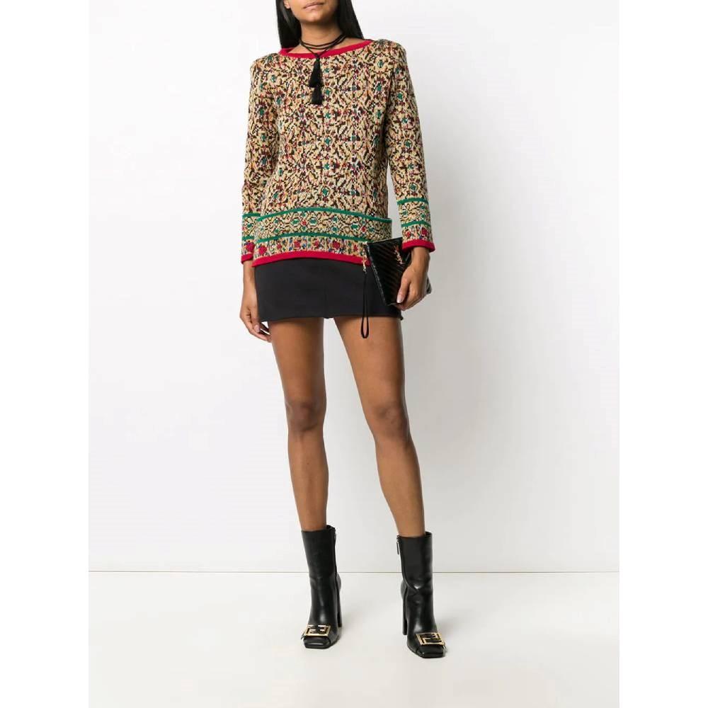 Yves Saint Laurent multicolor knitted wool 80s sweater with round collar and patch pockets.

Size: 36 FR

Flat measurements
Height: 59 cm
Bust: 46 cm
Sleeves: 57 cm
Shoulders: 38 cm

Product code: A8468

Composition: 100% Wool

Made in: