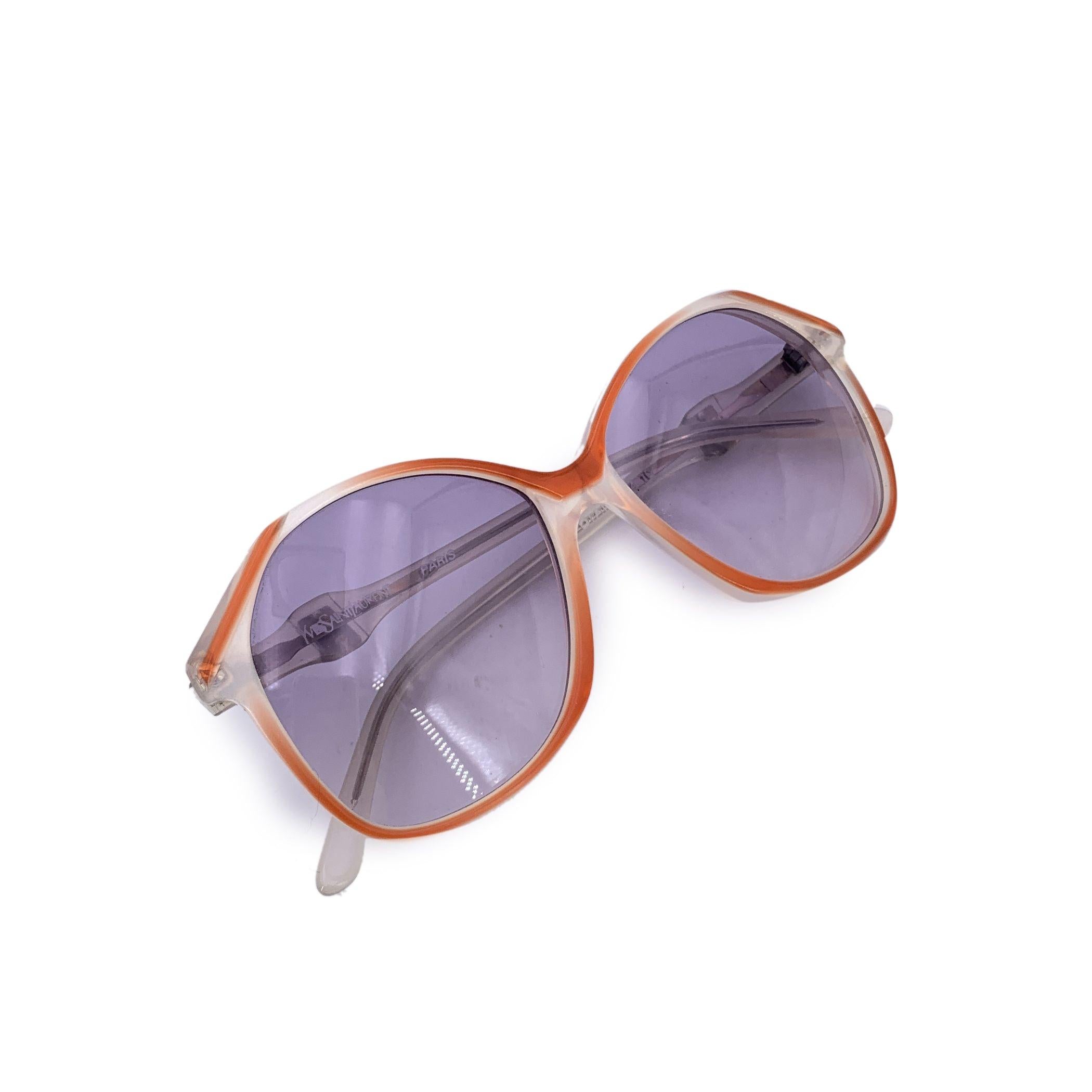 Bold, radiant, and unmistakably chic - these Yves Saint Laurent vintage orange sunglasses, model DIANE, are a glowing tribute to 1980s French glamour. With their striking butterfly silhouette and rich orange hue, they channel both sophistication and