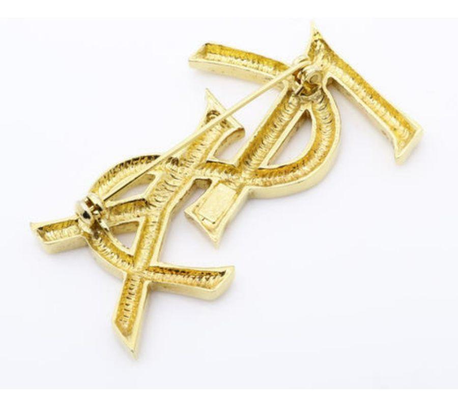 Yves Saint Laurent Vintage Pin Brooch Features GoldTone Hardware For Sale at 1stDibs yves