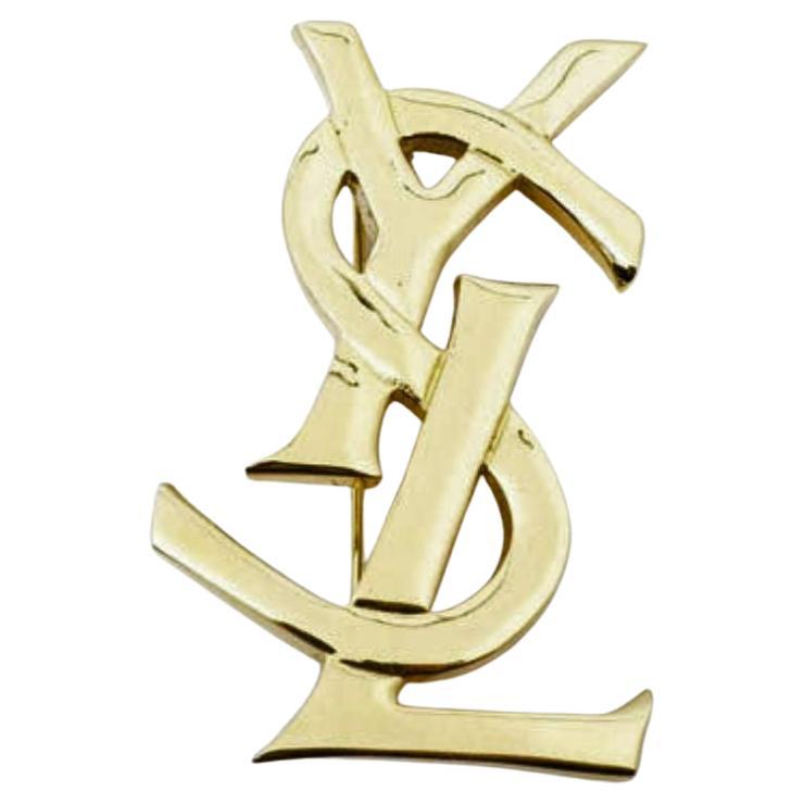 Yves Saint Laurent Vintage pin brooch features goldtone hardware For Sale at 1stDibs